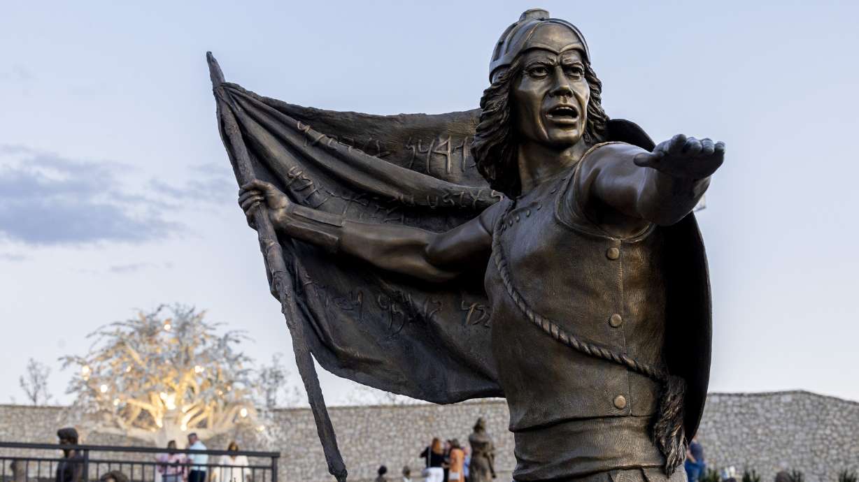 A bronze statue of Captain Moroni depicts a scene from Lehi’s vision in the Book of Mormon at the Tree of Life sculpture garden at the Ashton Gardens at Thanksgiving Point in Lehi on Wednesday.