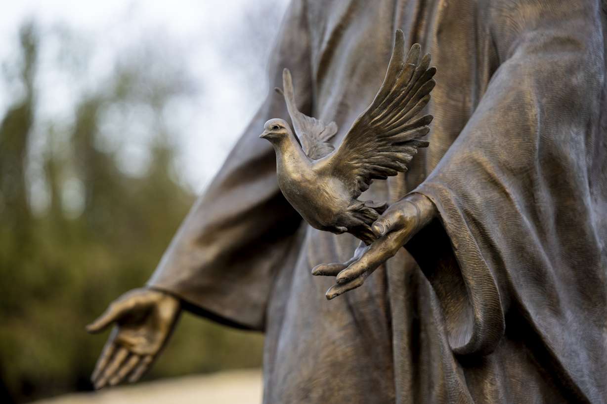 A bronze statue stands at the Tree of Life sculpture garden at the Ashton Gardens at Thanksgiving Point in Lehi on Wednesday.