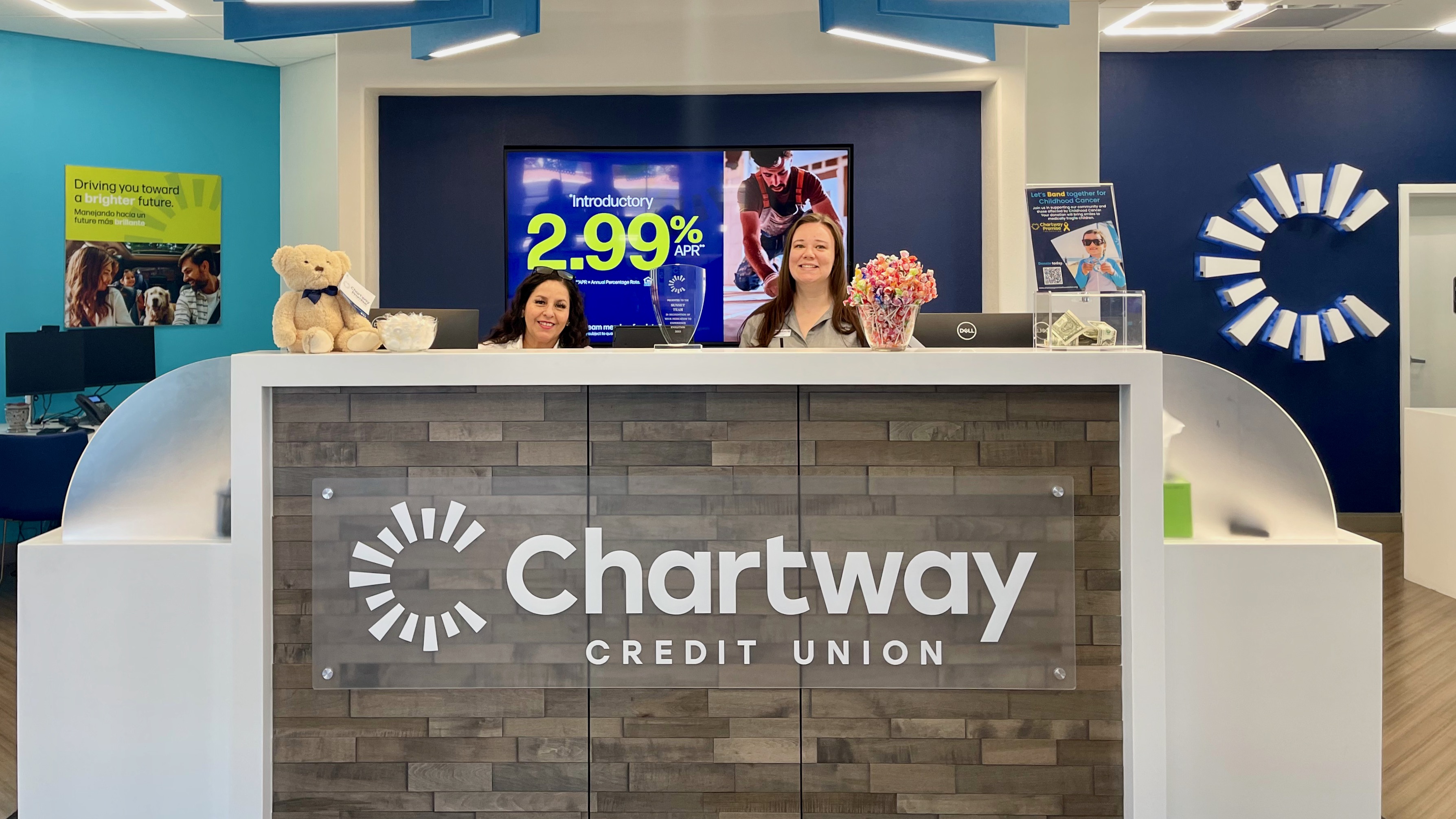 Workers at the Chartway Credit Union branch in St. George held a ceremony on Thursday to recognize the credit union's designation as a Juntos Avanzamos site.