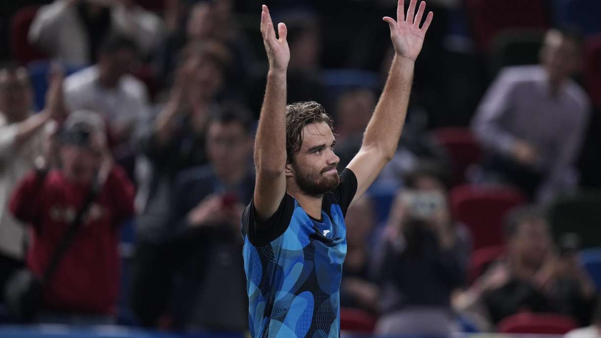 Tomas Machac of the Czech Republic celebrates after defeating Carlos Alcaraz of Spain in the men's singles quarterfinals match of the Shanghai Masters tennis tournament at Qizhong Forest Sports City Tennis Center in Shanghai, China, Thursday, Oct. 10, 2024.