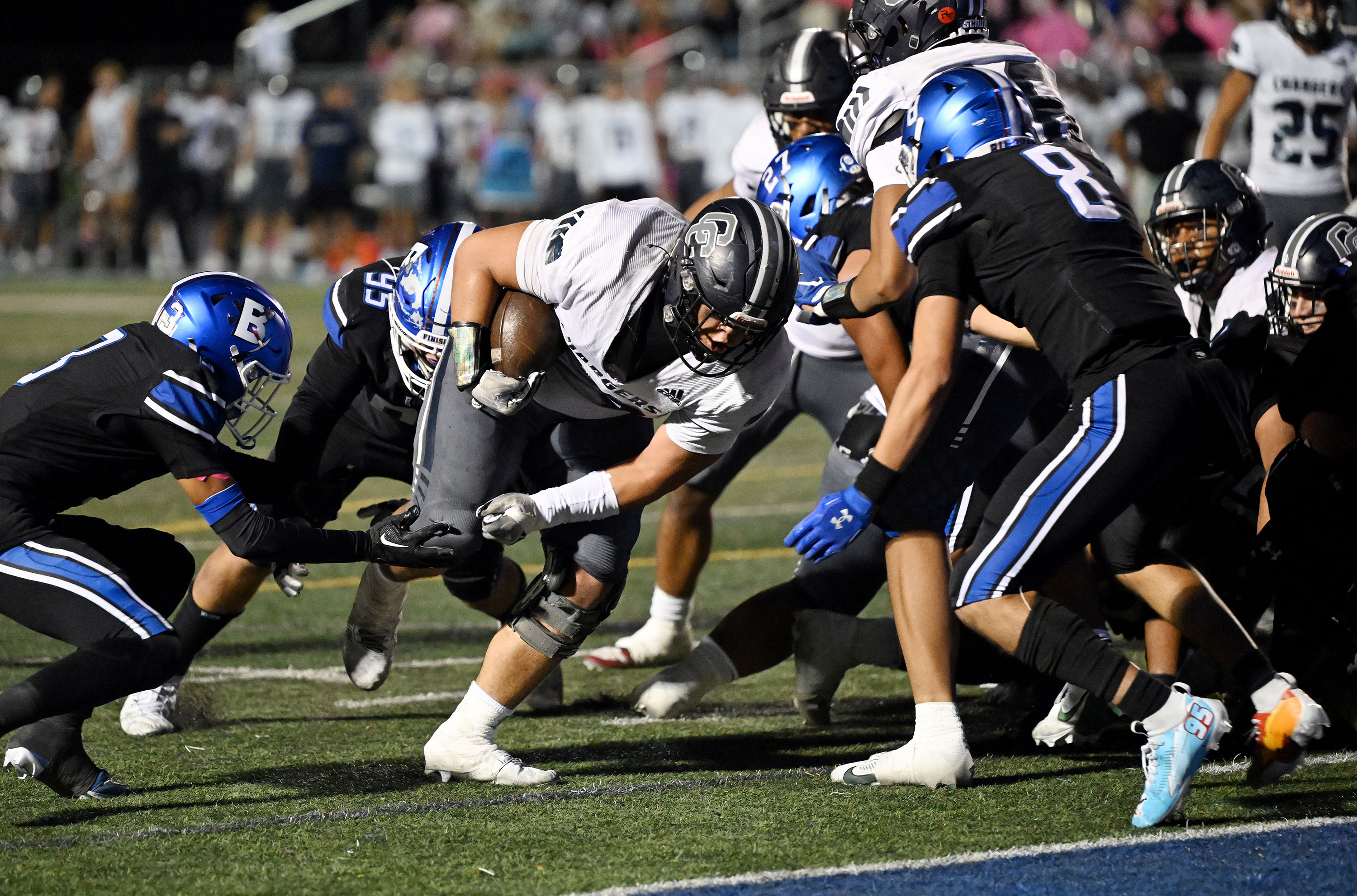 Corner Canyon’s Zion Finau slams in for a touchdown as they and Bingham play in South Jordan on Friday Oct. 11, 2024. Corner Canyon won 37-21.