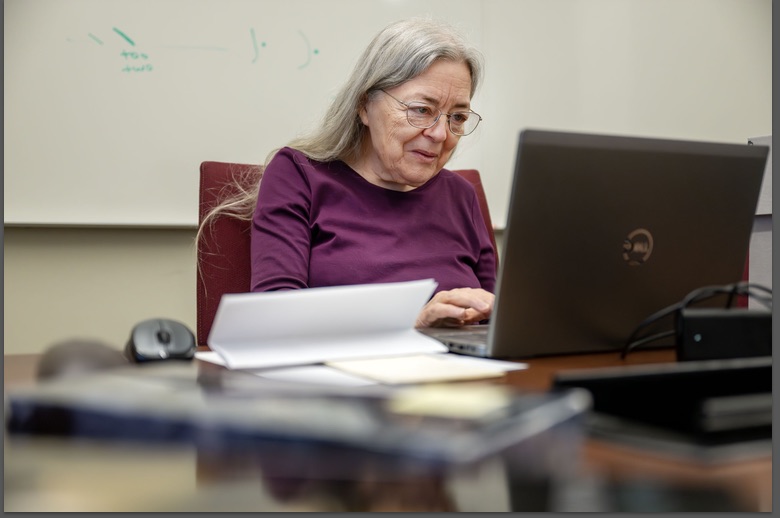 LaJean Purcell Carruth, a senior historian in The Church of Jesus Christ of Latter-day Saints' History Department and transcriber of manuscripts written in Pitman and Taylor shorthands and in the Deseret Alphabet, poses for a photo as she takes a short break from work on transcribing shorthand written by George D. Watt, while she works in Salt Lake City on Oct. 7.