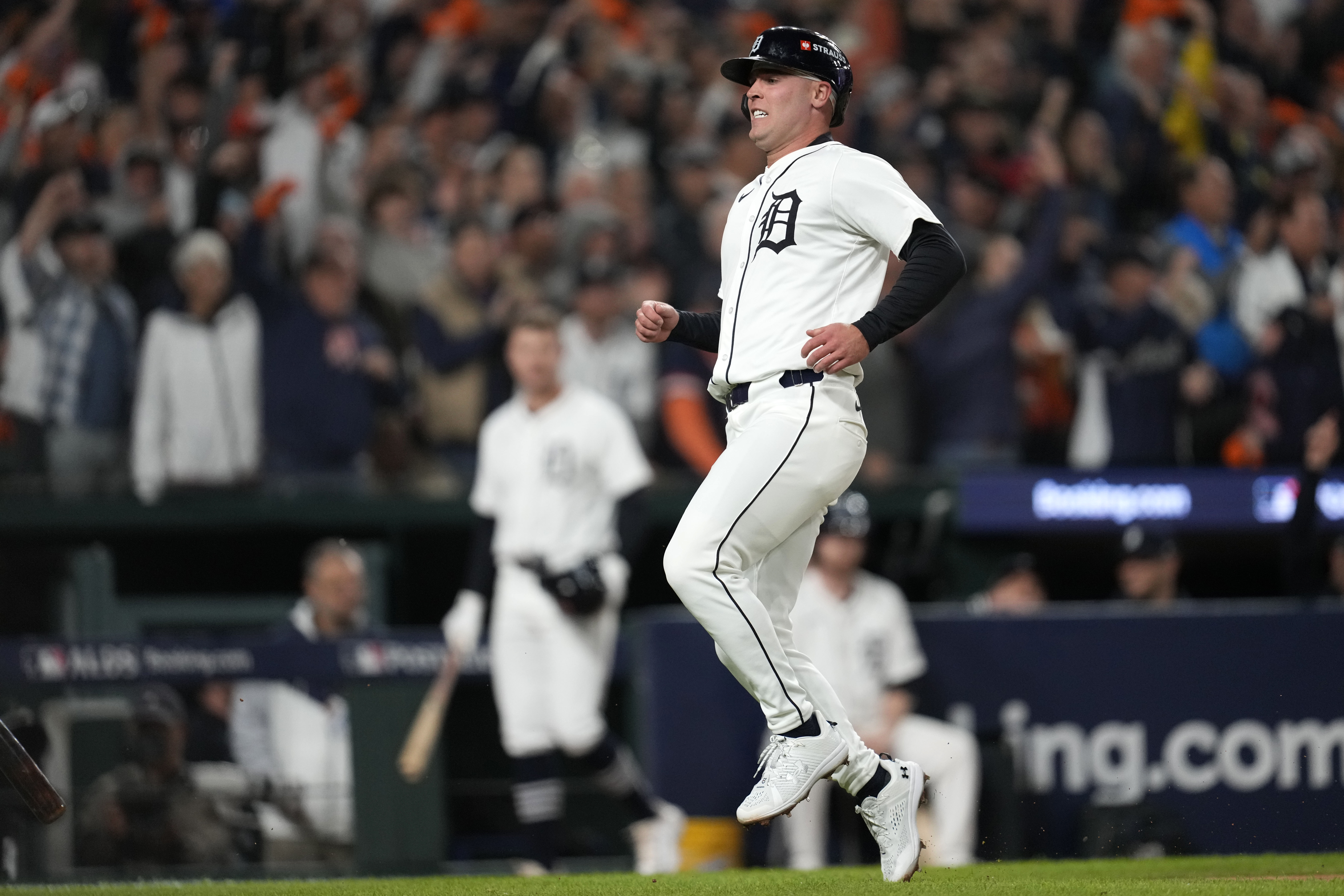 Detroit Tigers' Kerry Carpenter reacts after scoring in the sixth inning during Game 4 of a baseball American League Division Series against the Cleveland Guardians, Thursday, Oct. 10, 2024, in Detroit.