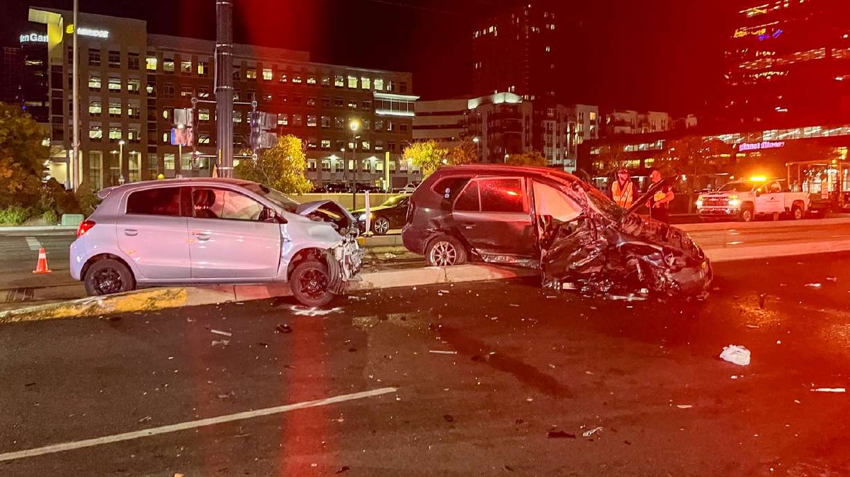 Two heavily damaged cars following a crash at 400 S. State in Salt Lake City.