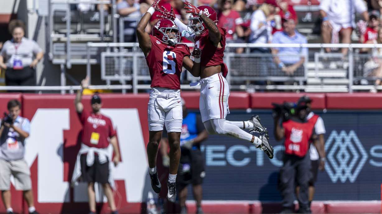 Alabama defensive backs Kameron Howard (6) and DeVonta Smith (8) celebrate a defensive stop against South Carolina during the first half of an NCAA college football game, Saturday, Oct. 12, 2024, in Tuscaloosa, Ala.