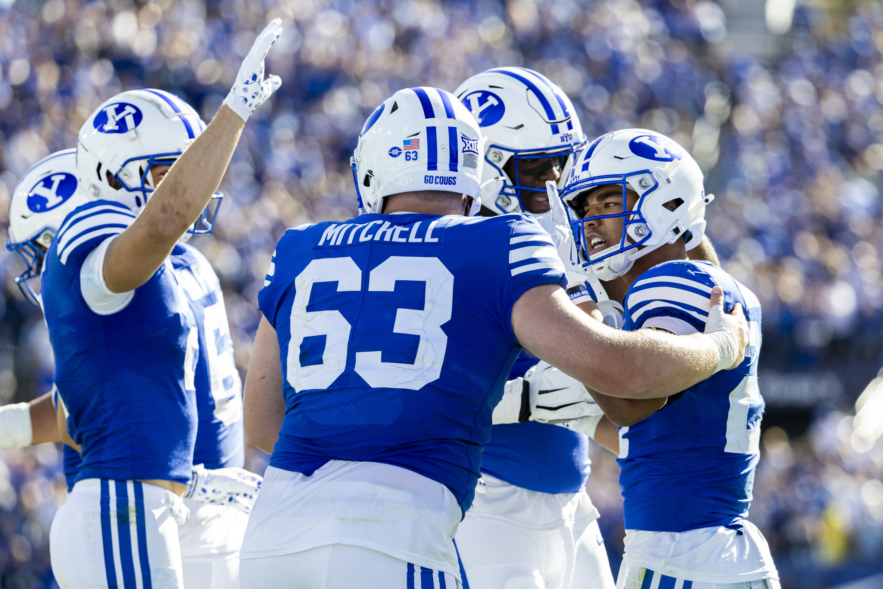 BYU running back LJ Martin (27) celebrates his touchdown reception with his teammates during a game against the Arizona Wildcats held at LaVell Edwards Stadium in Provo on Saturday, Oct. 12, 2024.