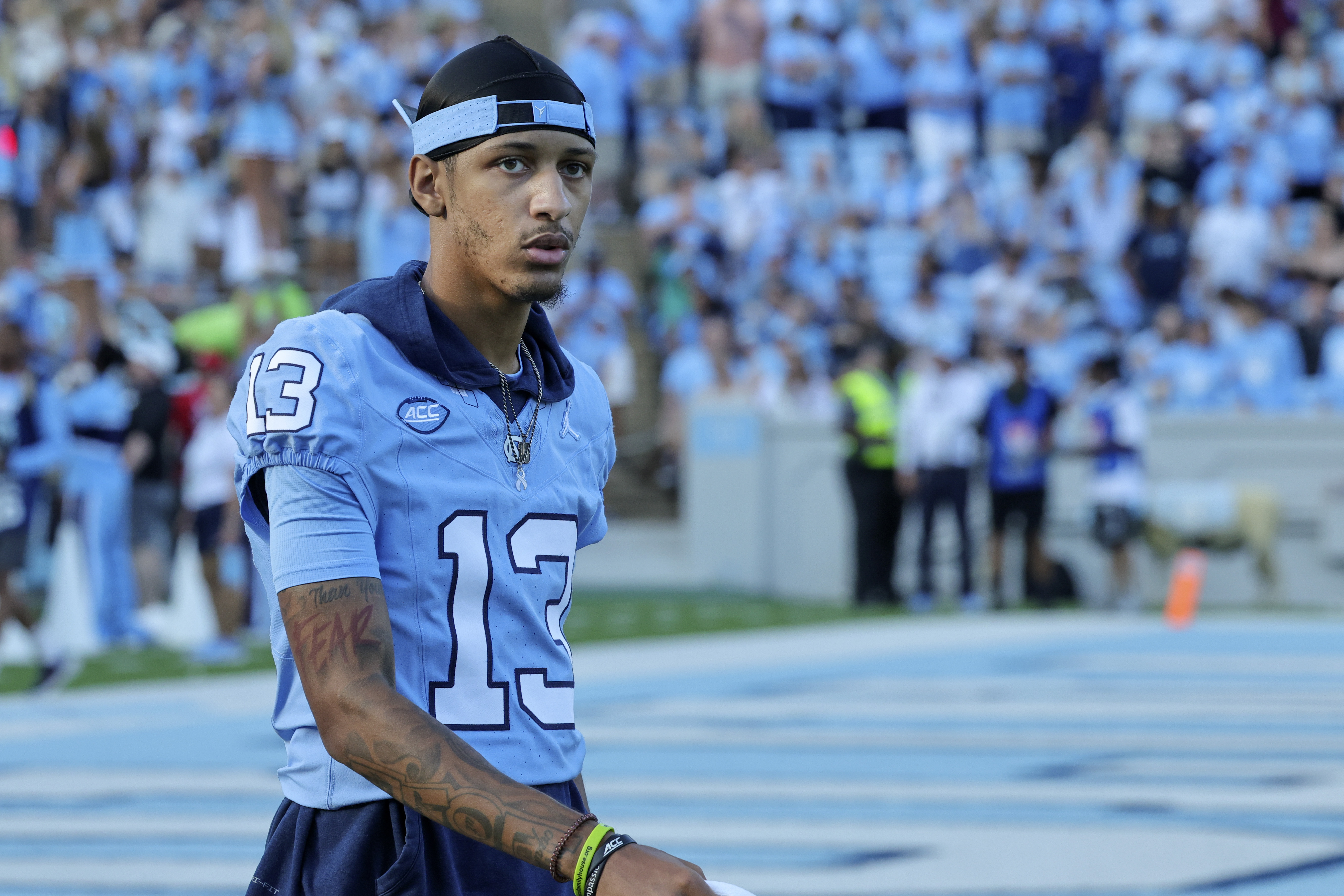 FILE - North Carolina wide receiver Tylee Craft (13) walks the bench during the second half of an NCAA college football game against Minnesota, Sept. 16, 2023, in Chapel Hill, N.C.