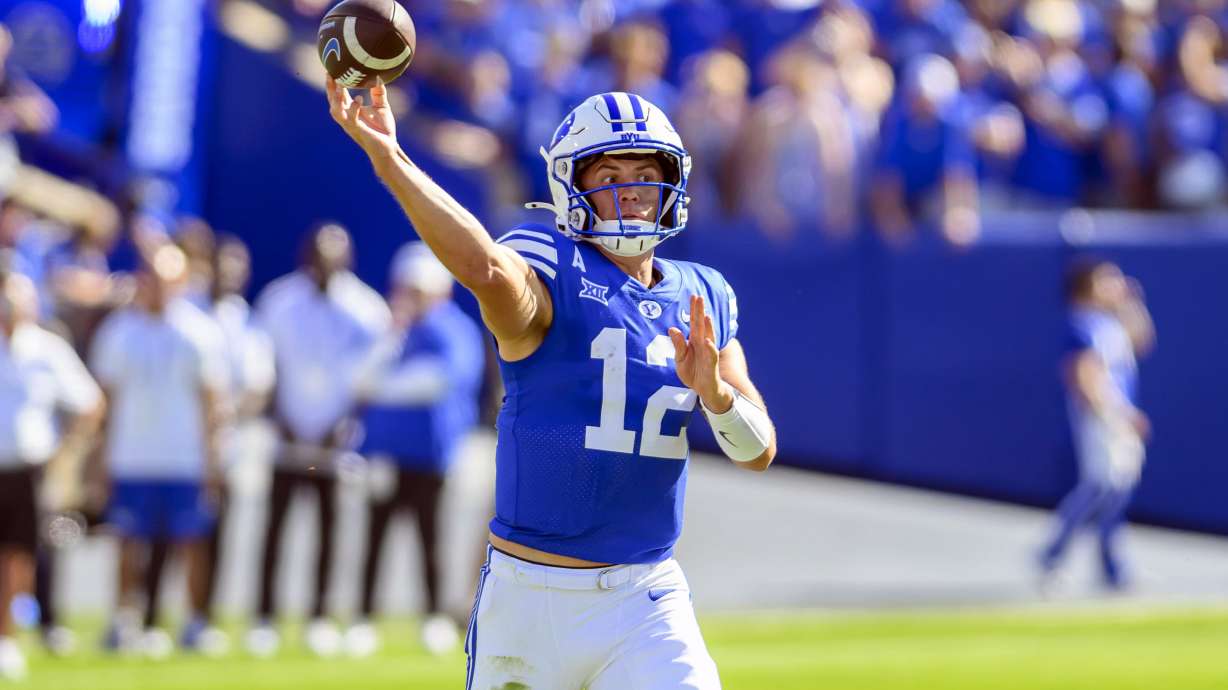 BYU quarterback Jake Retzlaff looks to pass the ball during an NCAA college football game against Arizona, Saturday, Oct. 12, 2024, in Provo, Utah.