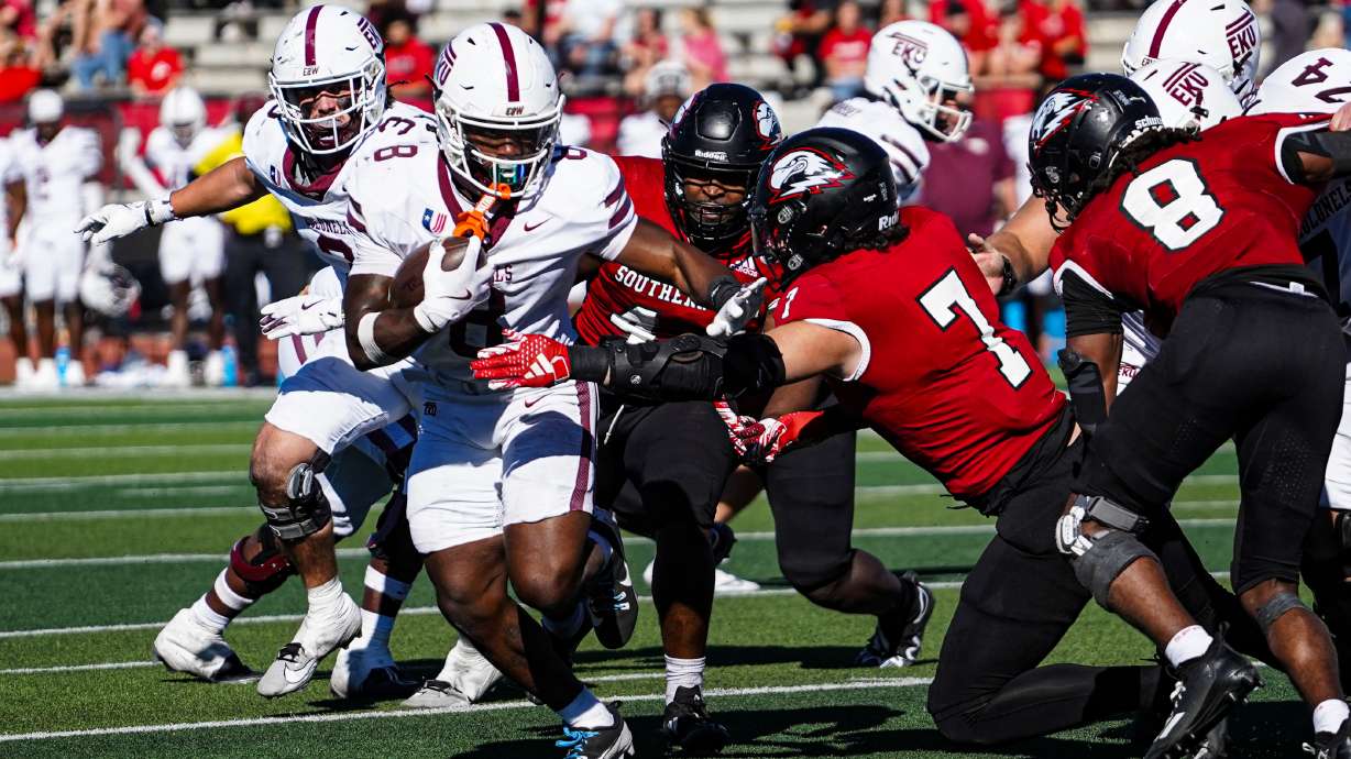 Eastern Kentucky's Joshua Carter carries the ball in a homecoming game against Southern Utah in Cedar City on Oct. 12, 2024.