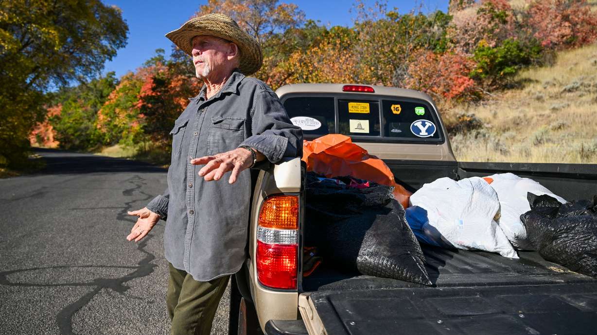 Bill Allinson talks about the canyon as he poses for photos in Butterfield Canyon near Herriman on Sept. 30. Three times a week Allinson cleans up whatever people leave in the camp areas and along the road.