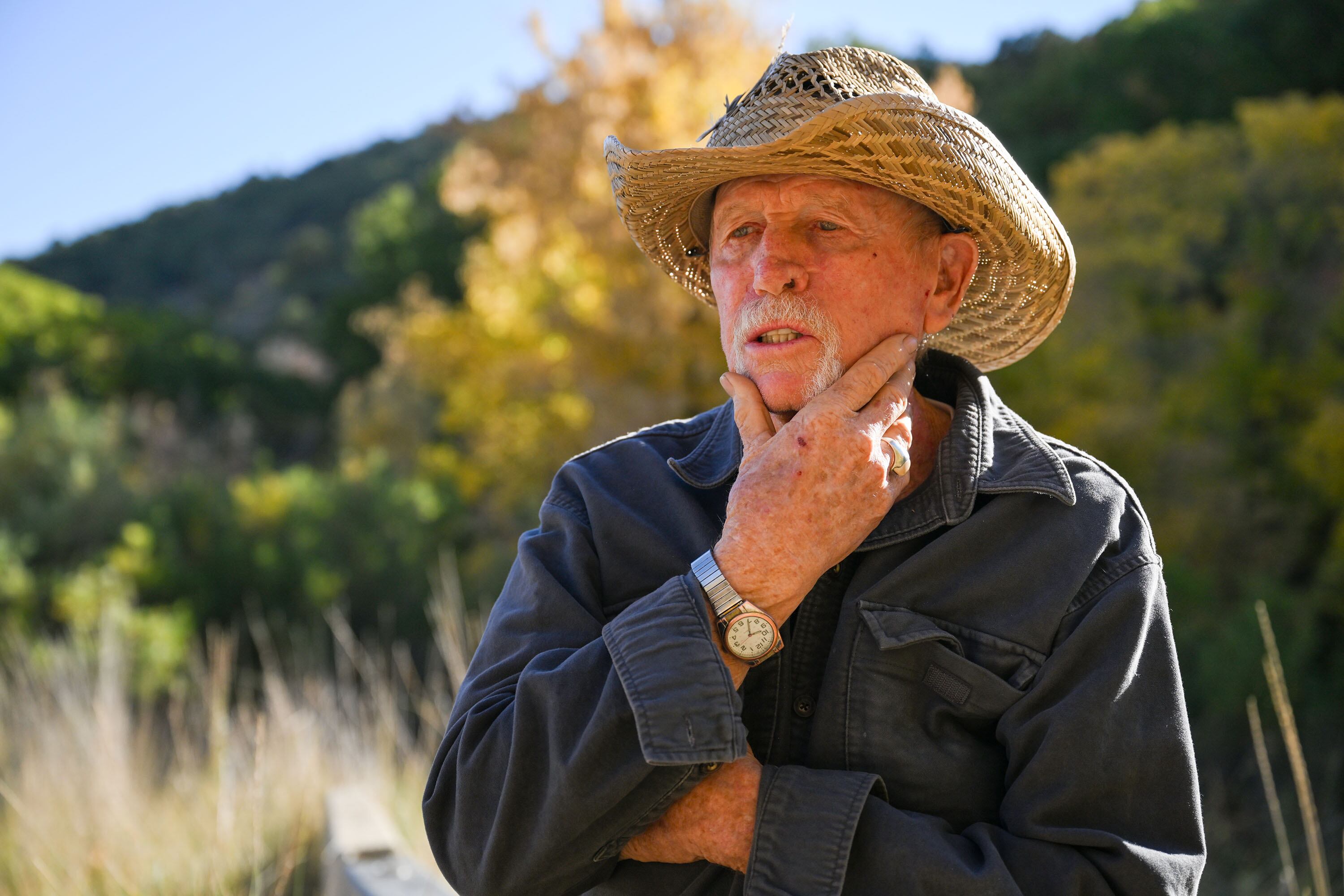 Bill Allinson talks about the canyon as he poses for photos in Butterfield Canyon near Herriman on Sept. 30. Three times a week Allinson cleans up whatever people leave in the camp areas and along the road.