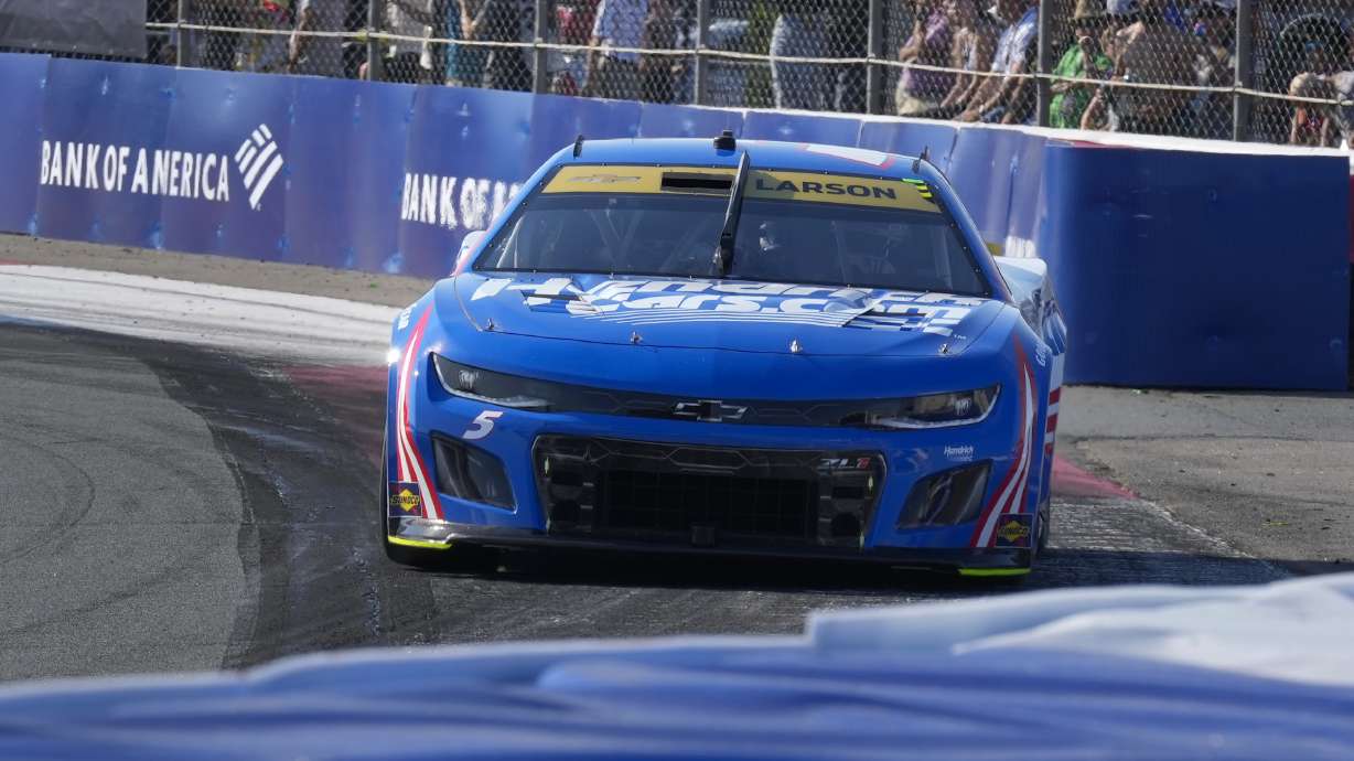 Kyle Larson drives out out Turn 3 during a NASCAR Cup Series auto race at Charlotte Motor Speedway in Concord, N.C., Sunday, Oct. 13, 2024.