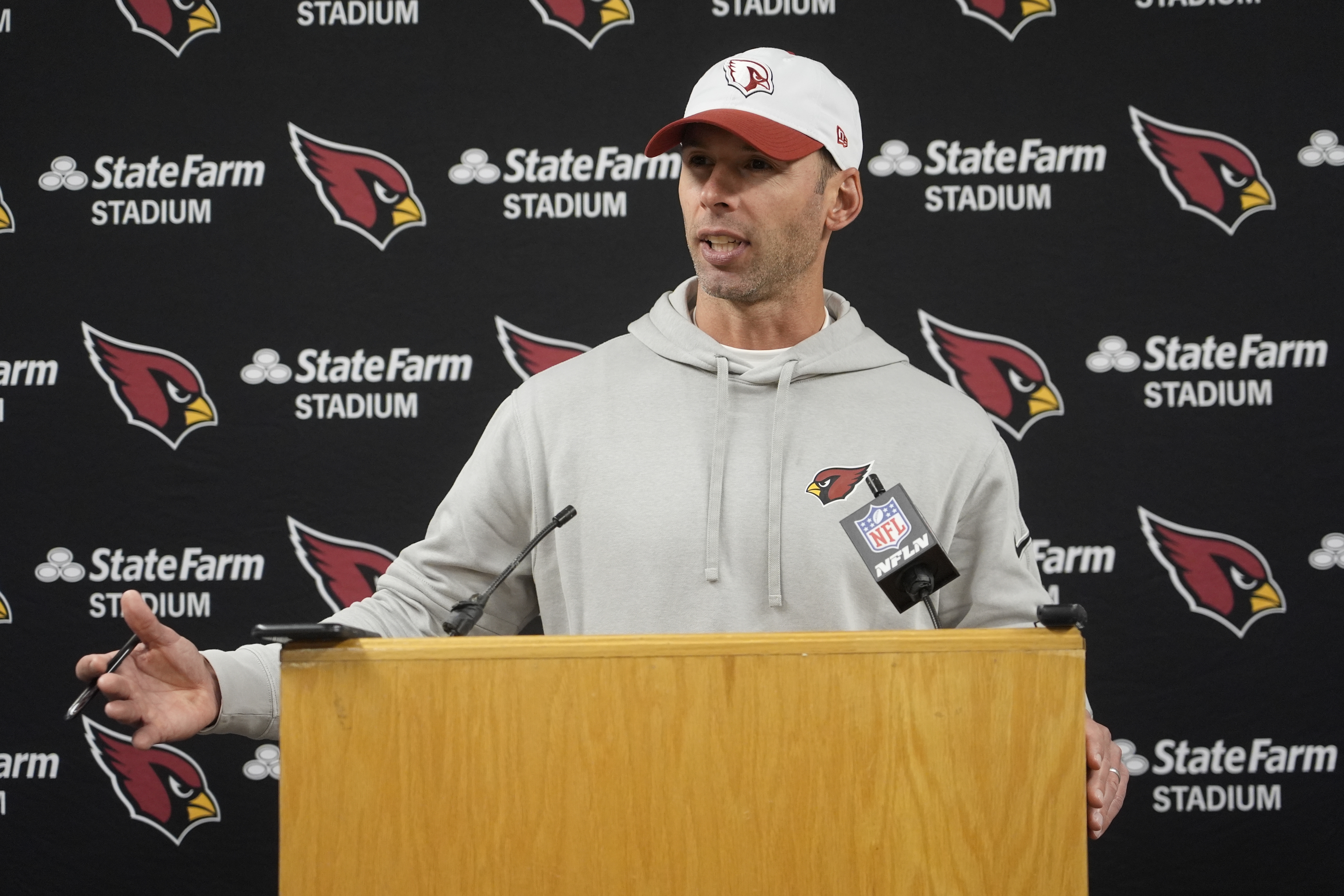 Arizona Cardinals head coach Jonathan Gannon answers questions after an NFL football game against the Green Bay Packers Sunday, Oct. 13, 2024, in Green Bay, Wis.