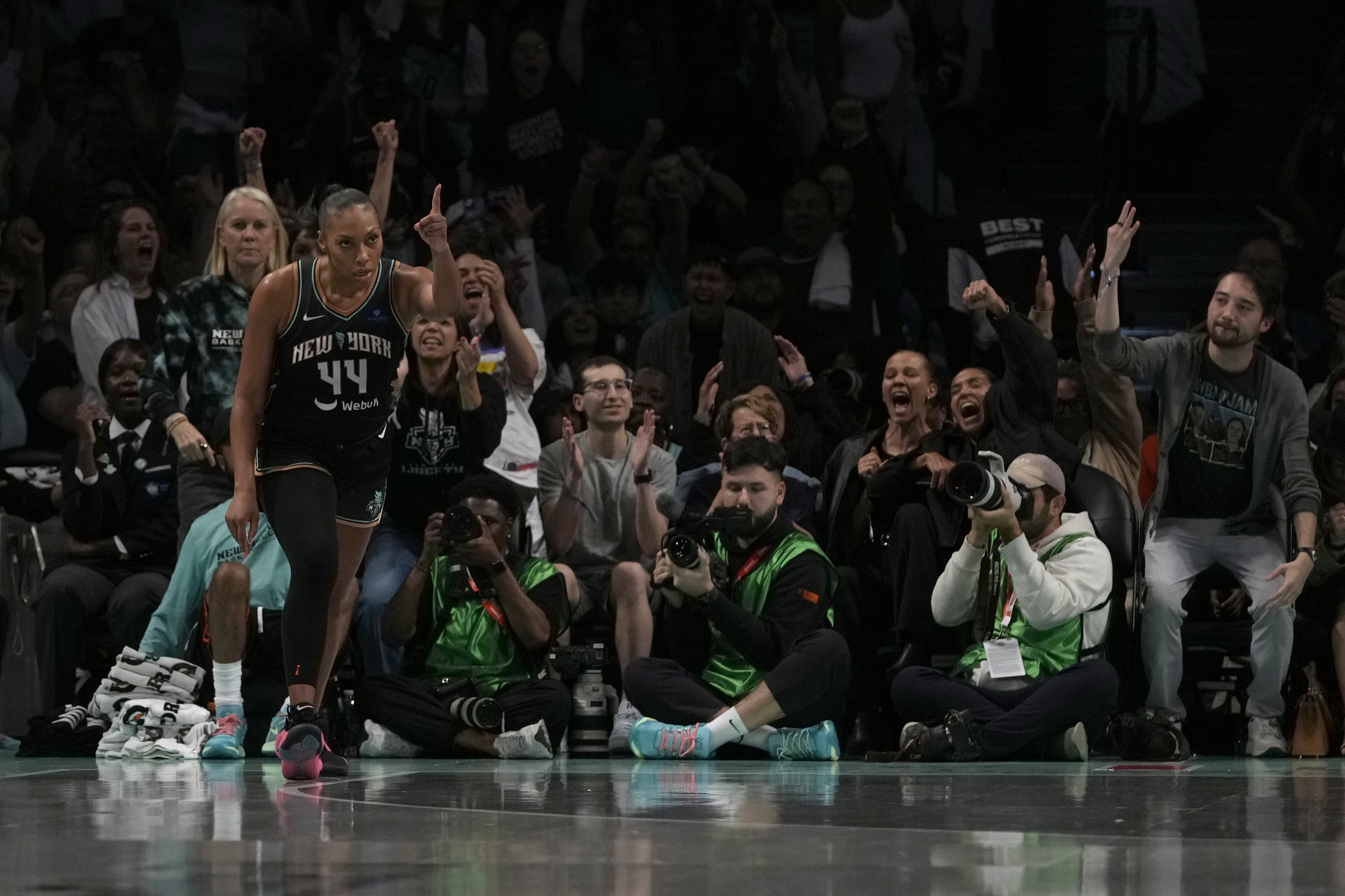 New York Liberty's Betnijah Laney-Hamilton (44) reacts after scoring during the second half in Game 2 of a WNBA basketball final playoff series against the Minnesota Lynx, Sunday, Oct. 13, 2024, in New York.