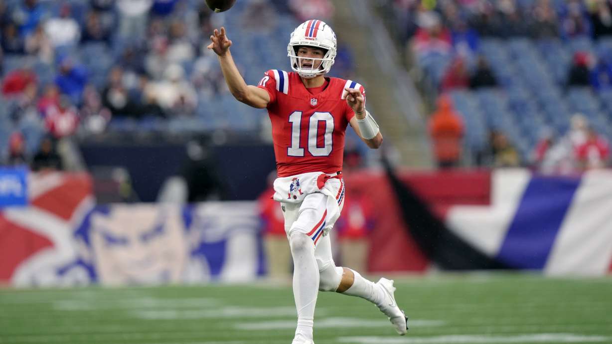 New England Patriots quarterback Drake Maye passes the ball during the second half of an NFL football game against the Houston Texans, Sunday, Oct. 13, 2024, in Foxborough, Mass.