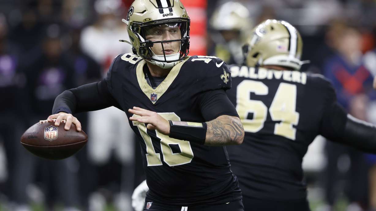 New Orleans Saints quarterback Spencer Rattler passes against the Tampa Bay Buccaneers during the second half of an NFL football game in New Orleans, Sunday, Oct. 13, 2024.
