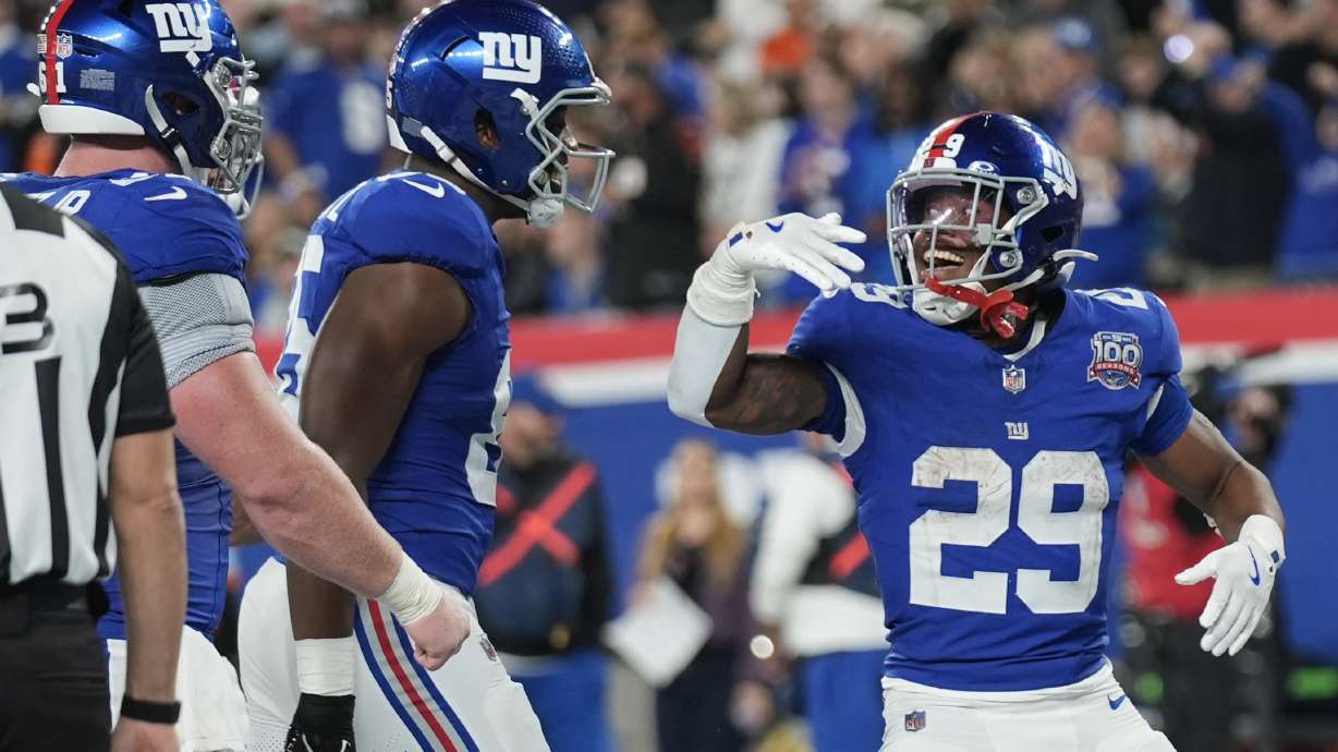 New York Giants running back Tyrone Tracy Jr. (29) celebrates scoring a touchdown during the second half of an NFL football game against the Cincinnati Bengals, Sunday, Oct. 13, 2024, in East Rutherford, N.J.