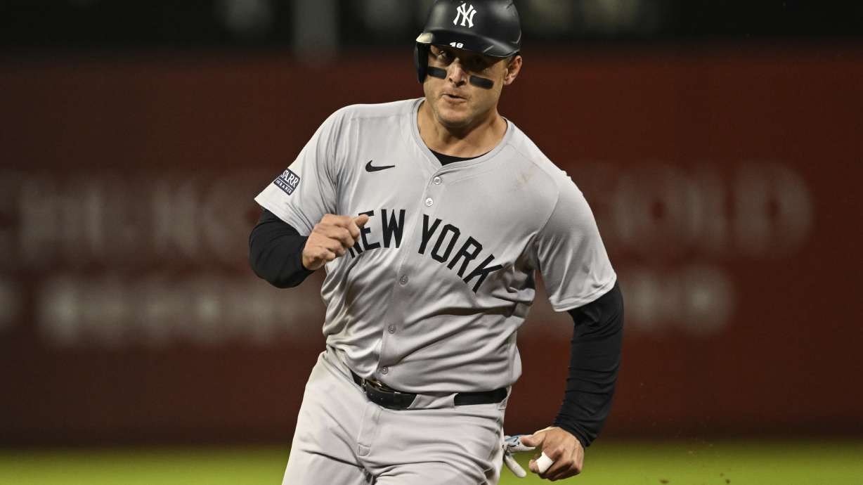 New York Yankees' Anthony Rizzo runs to third base during the fifth inning of a baseball game against the Oakland Athletics, Friday, Sept. 20, 2024, in Oakland, Calif.