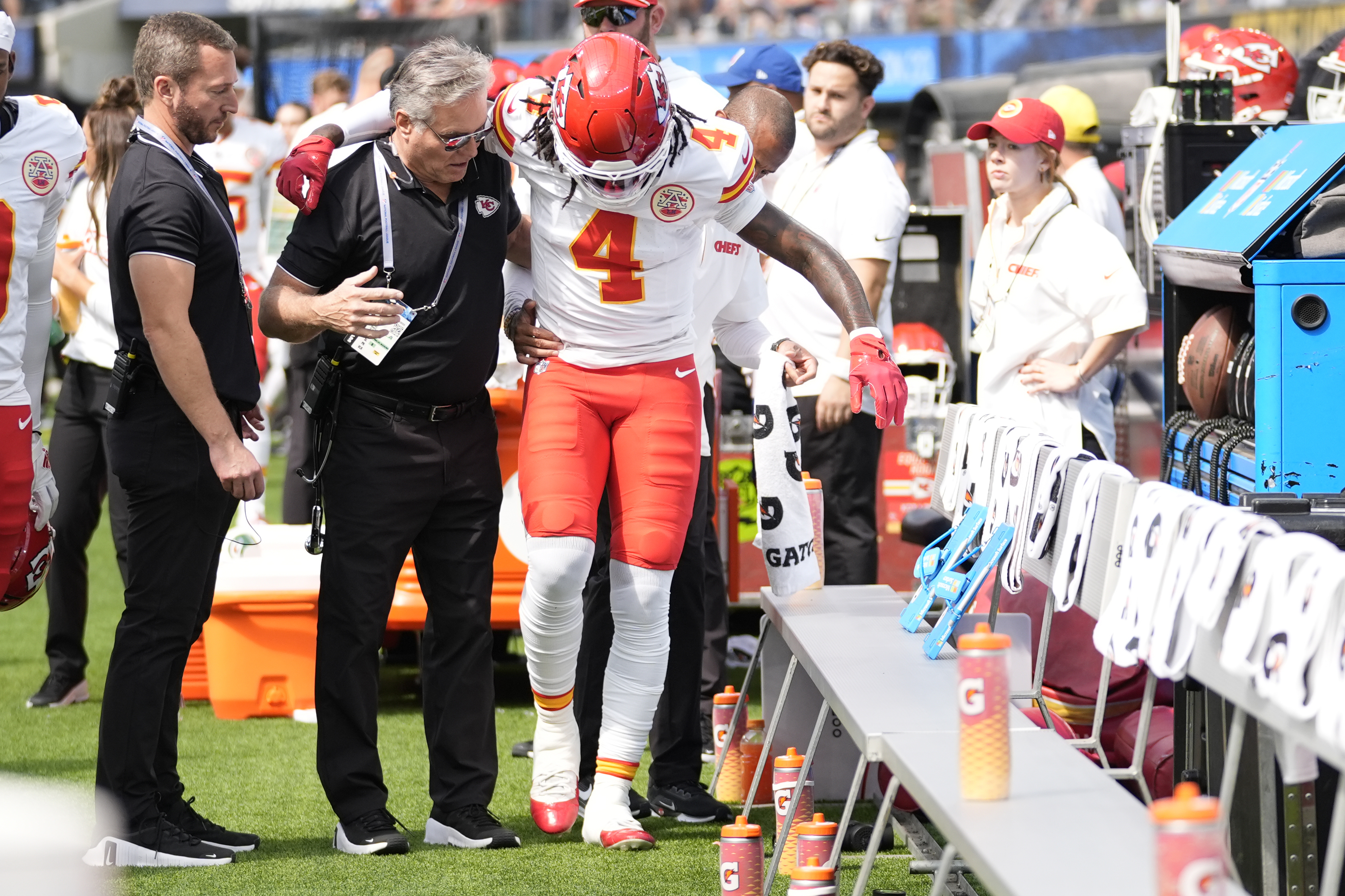 Kansas City Chiefs wide receiver Rashee Rice (4) is assisted after being injured during the first half of an NFL football game against the Los Angeles Chargers Sunday, Sept. 29, 2024, in Inglewood, Calif.