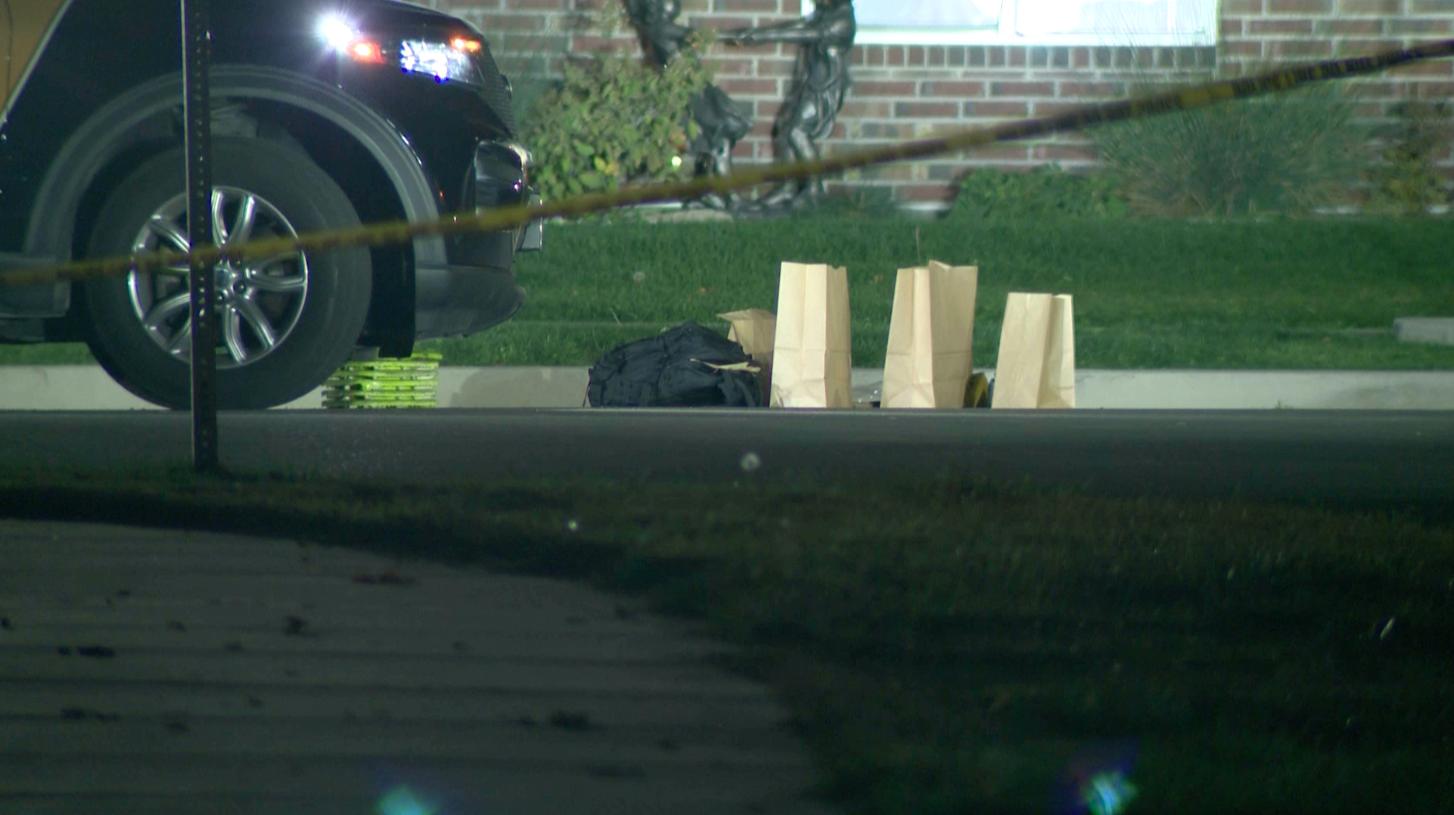 Police evidence bags sit outside a house at 1327 W. 50 North in Springville where a 35-year-old man was shot on Sunday. The man was taken to the hospital and is expected to recover.