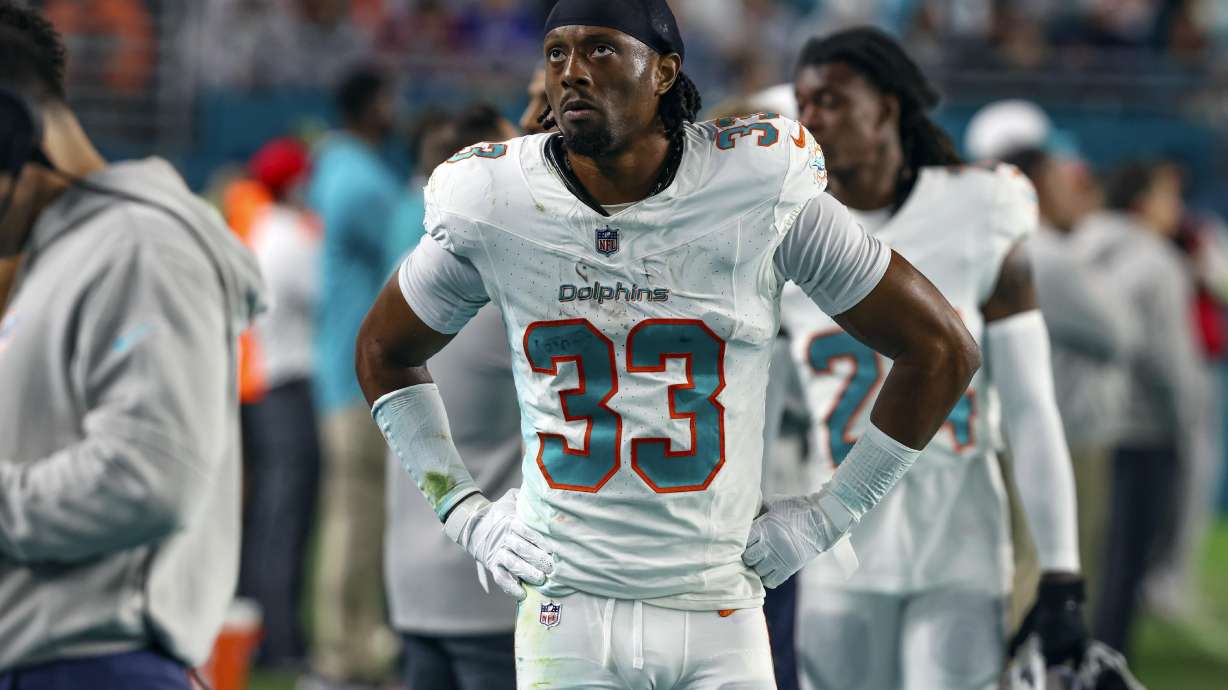 FILE - Miami Dolphins cornerback Eli Apple (33) walks the sidelines during an NFL football game against the Buffalo Bills, Jan. 7, 2024, in Miami Gardens, Fla.