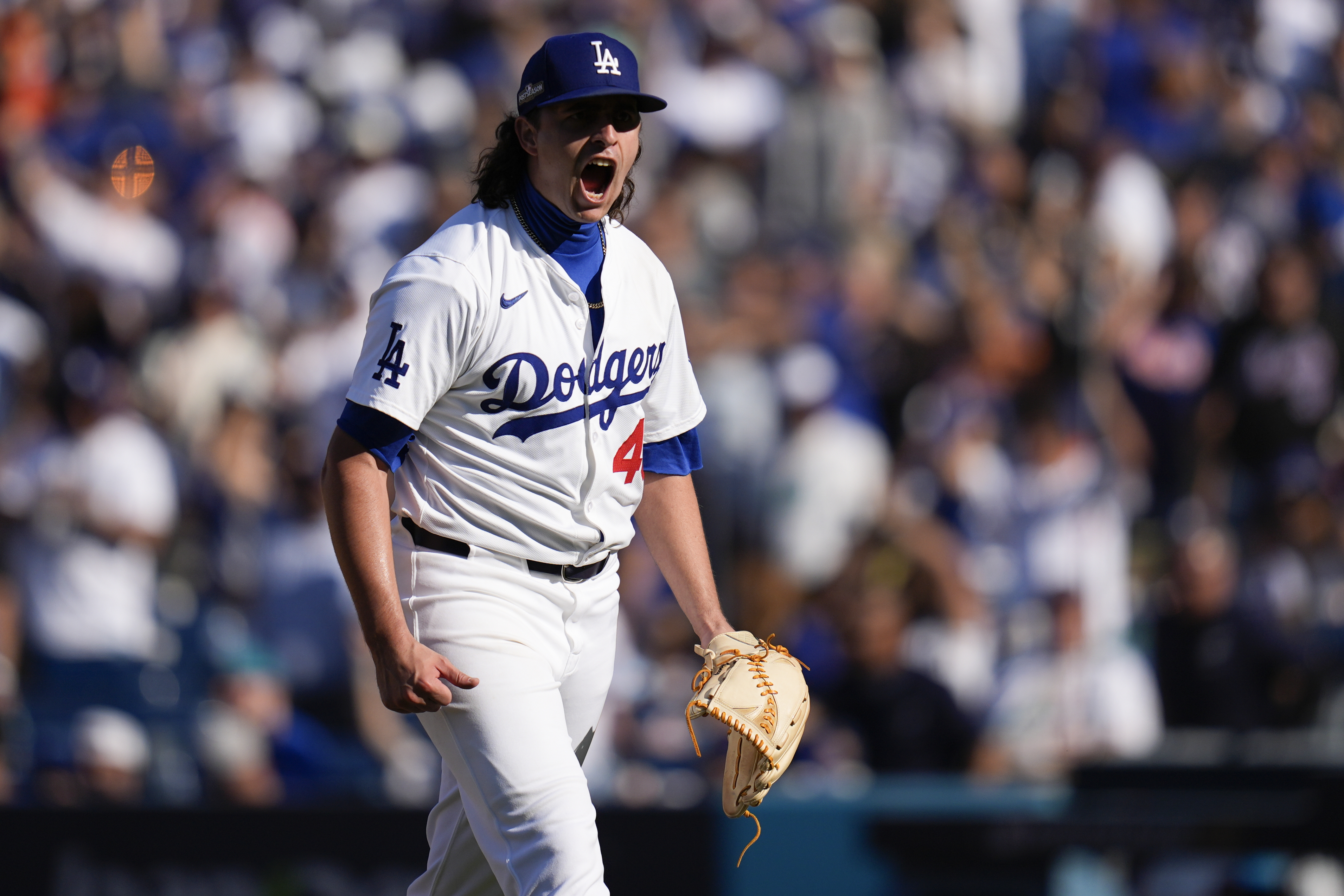 Los Angeles Dodgers pitcher Brent Honeywell celebrates after the last out in the top of the seventh inning in Game 2 of a baseball NL Championship Series against the New York Mets, Monday, Oct. 14, 2024, in Los Angeles.