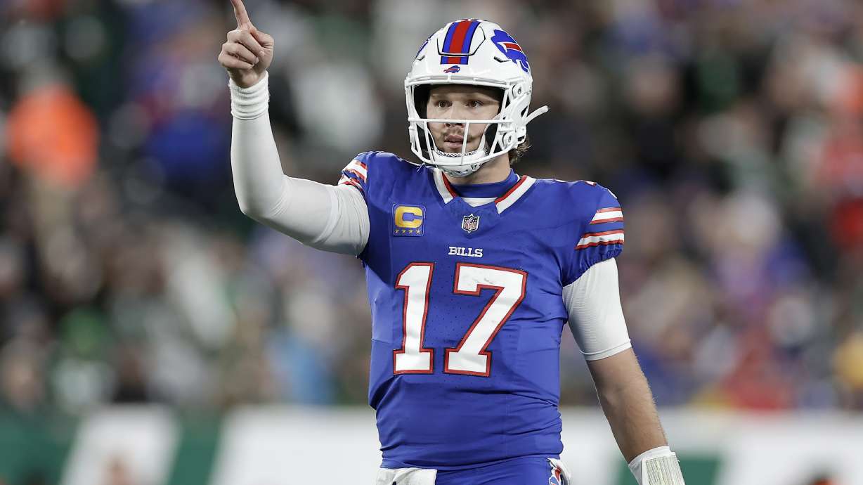 Buffalo Bills quarterback Josh Allen (17) gestures during the first half of an NFL football game against the New York Jets in East Rutherford, N.J., Monday, Oct. 14, 2024.