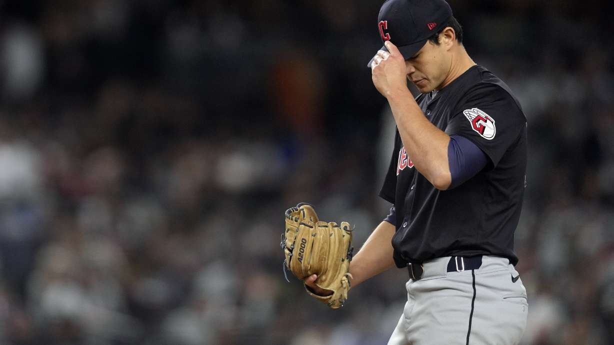 Cleveland Guardians relief pitcher Joey Cantillo adjusts his cap after walking New York Yankees' Gleyber Torres during the fourth inning in Game 1 of the baseball AL Championship Series Monday, Oct. 14, 2024, in New York.