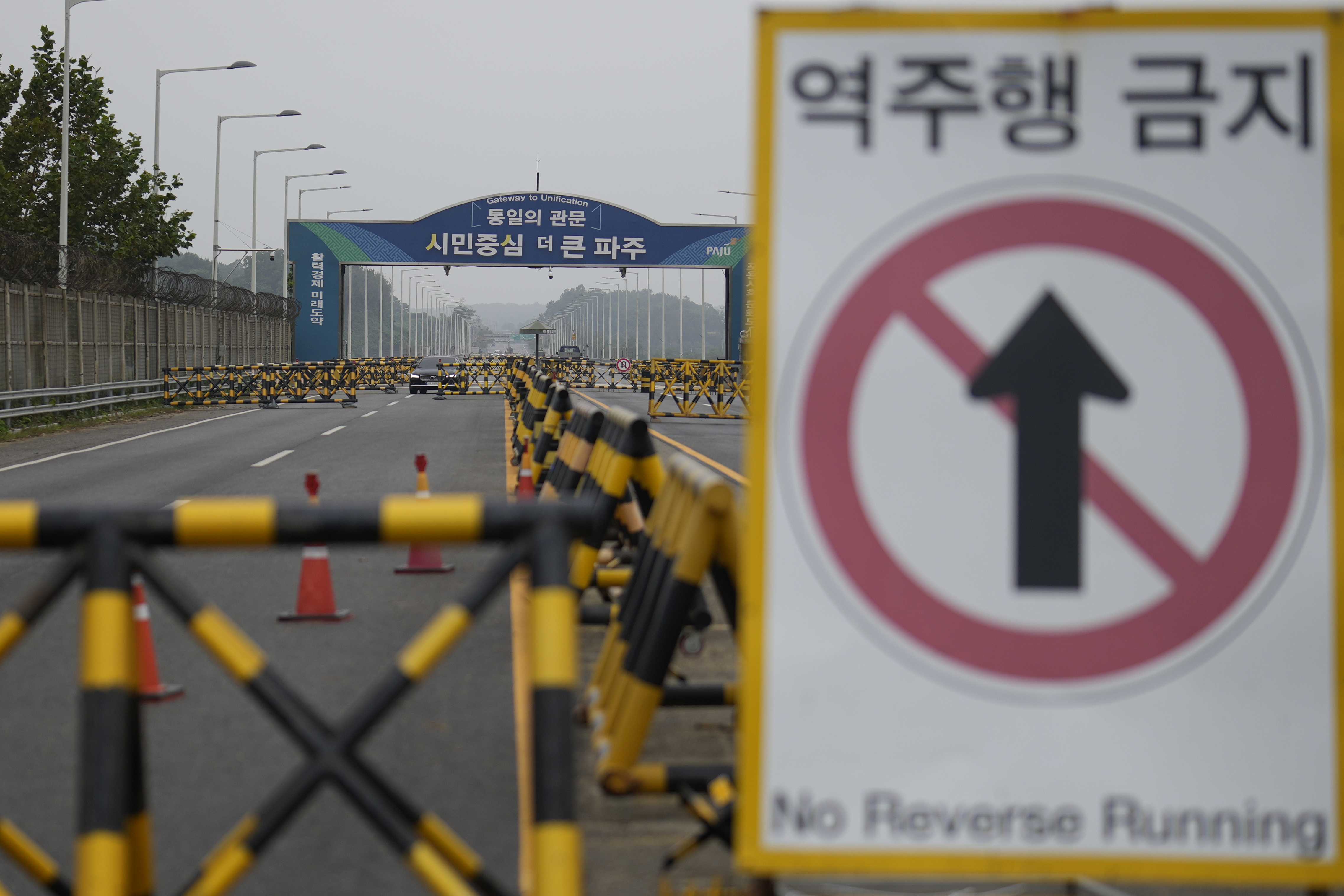 Barricades are placed near the Unification Bridge, which leads to the Panmunjom in the Demilitarized Zone in Paju, South Korea, Tuesday.