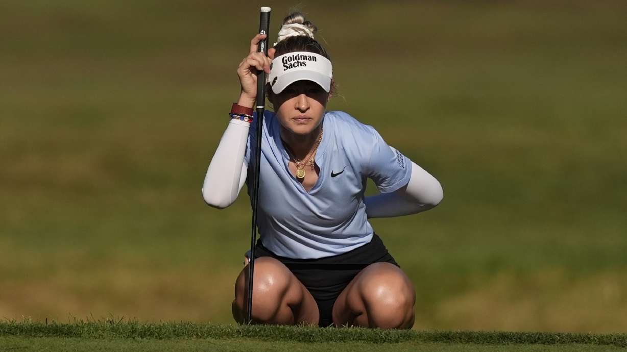 Nelly Korda, of the United States, lines up a putt on the first hole during the final round of the LPGA Kroger Queen City Championship golf tournament at TPC River's Bend in Maineville, Ohio, Sunday, Sept. 22, 2024.