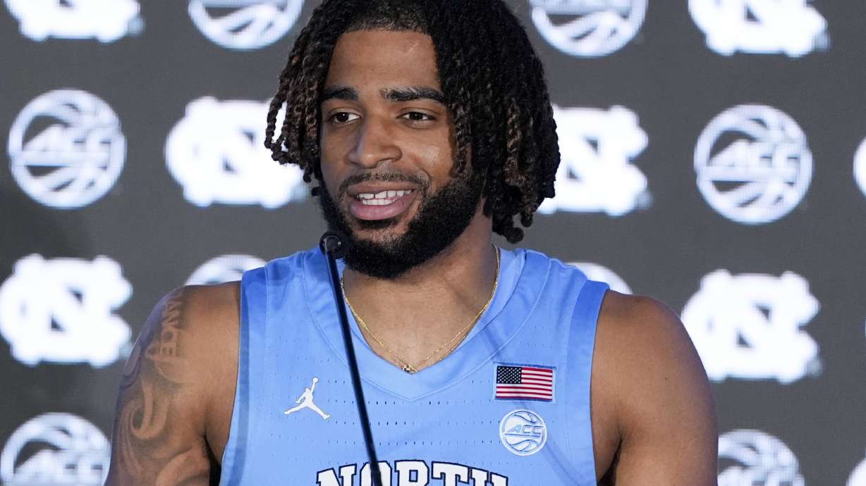 North Carolina guard RJ Davis speaks during a ACC men's NCAA college basketball media day, Thursday, Oct. 10, 2024, in Charlotte, N.C.