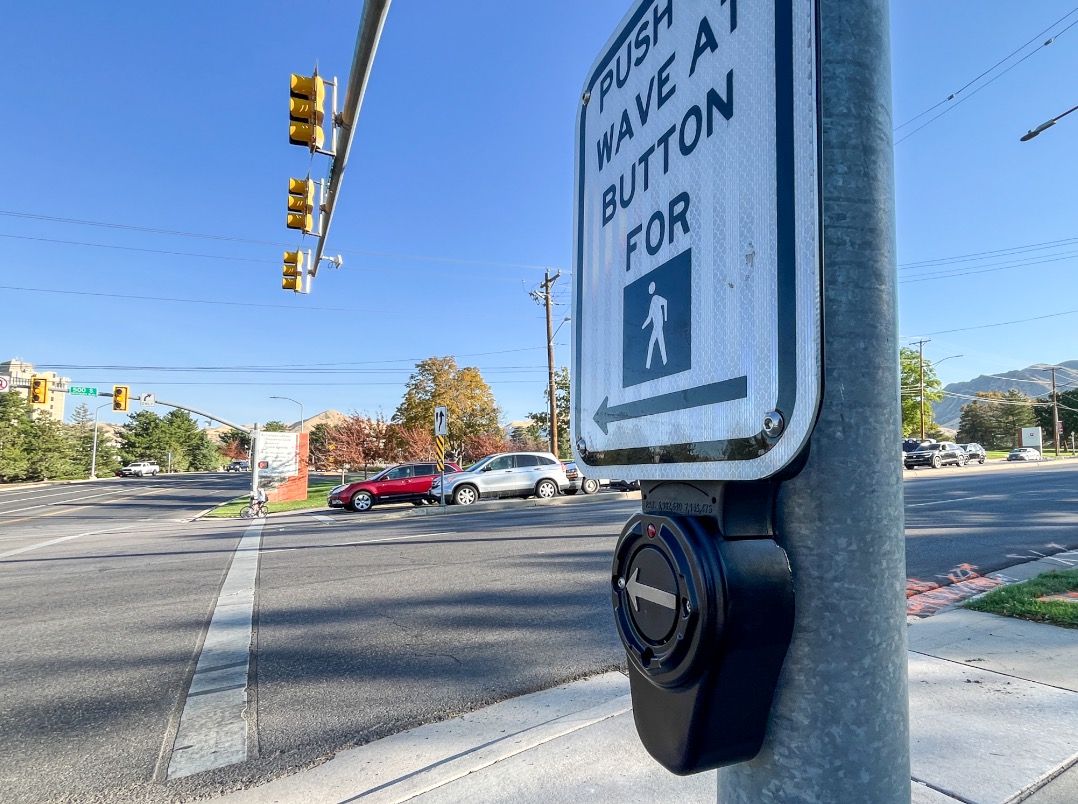 A crosswalk signal with accessible pedestrian signal technology is pictured in Salt Lake City Tuesday. Transportation officials are replacing old crosswalk buttons with a new technology that is more accessible for people crossing busy state roadways.