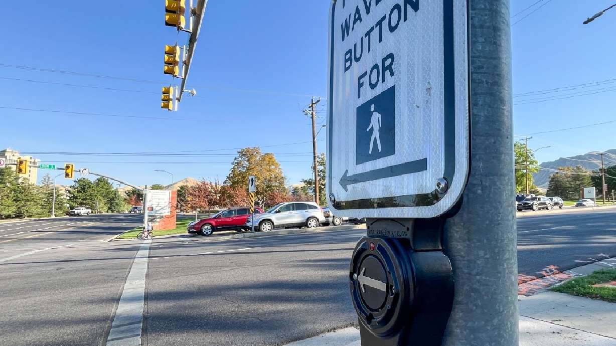 A crosswalk signal with accessible pedestrian signal technology is pictured in Salt Lake City Tuesday. Transportation officials are replacing old crosswalk buttons with a new technology that is more accessible for people crossing busy state roadways.