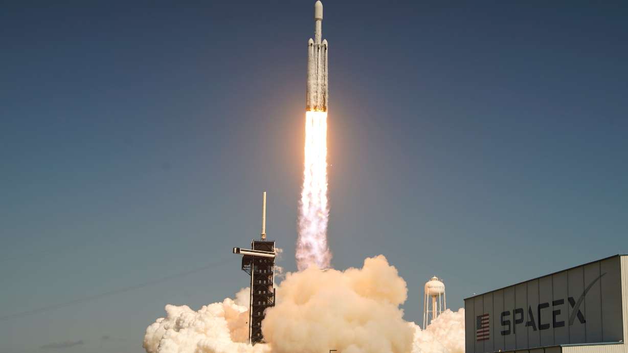 A SpaceX Falcon Heavy rocket with a NASA spacecraft bound for Jupiter lifts off from pad 39A at the Kennedy Space Center Monday in Cape Canaveral, Fla.