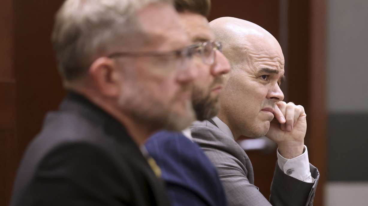 Robert Telles, right, a former Democratic official charged in the murder of investigative journalist Jeff German, listens to closing arguments during his murder trial in Las Vegas, Aug. 26. With Telles are his attorneys Robert Draskovich, left, and Michael Horvath. Wed, he was sentenced to 28 years for killing German.