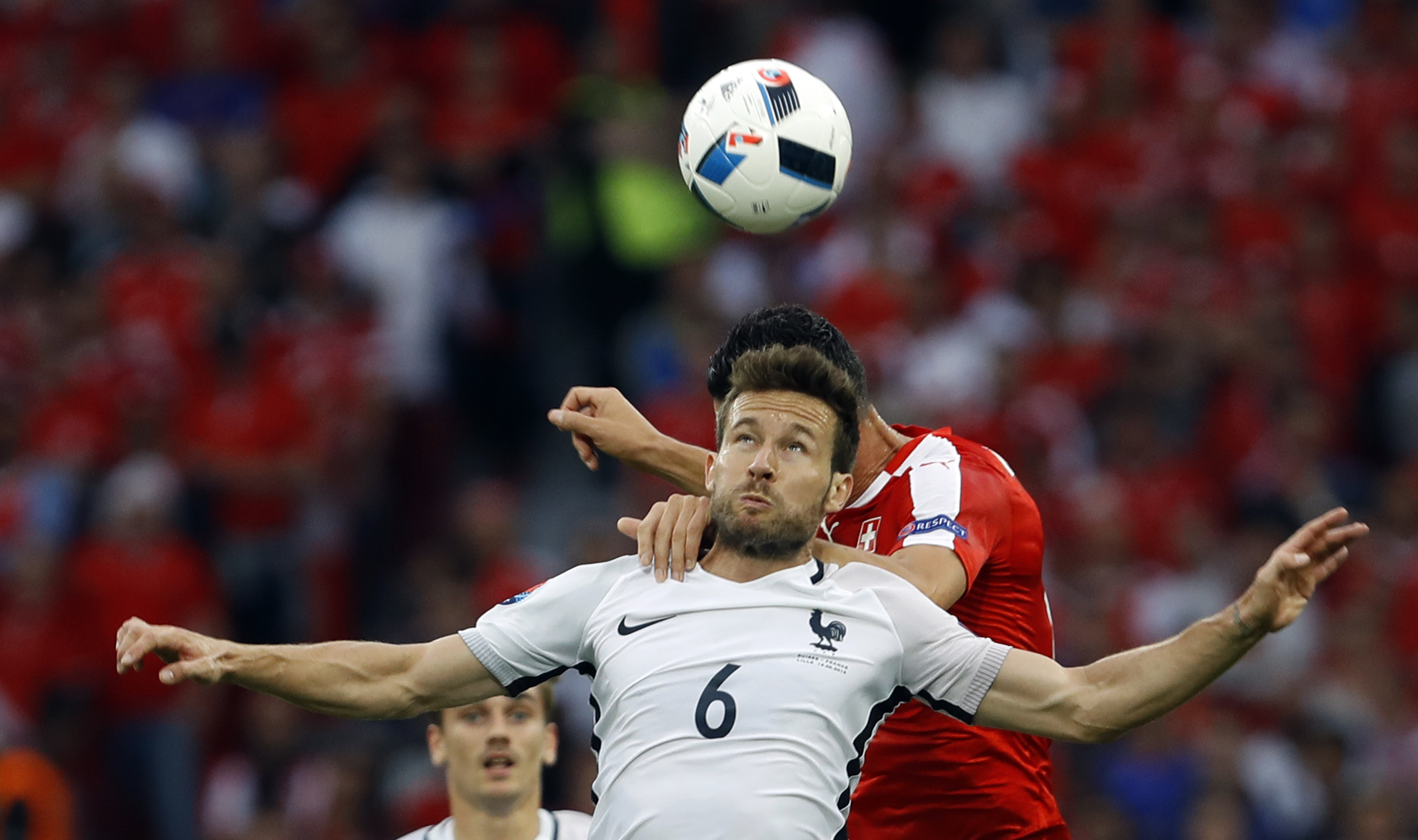 FILE - France's Yohan Cabaye, who has been named as the sporting director of French champion Paris Saint-Germain's youth academy, jumps for the ball during the Euro 2016 Group A soccer match between Switzerland and France at the Pierre Mauroy stadium in Villeneuve d'Ascq, near Lille, France, on June 19, 2016. 