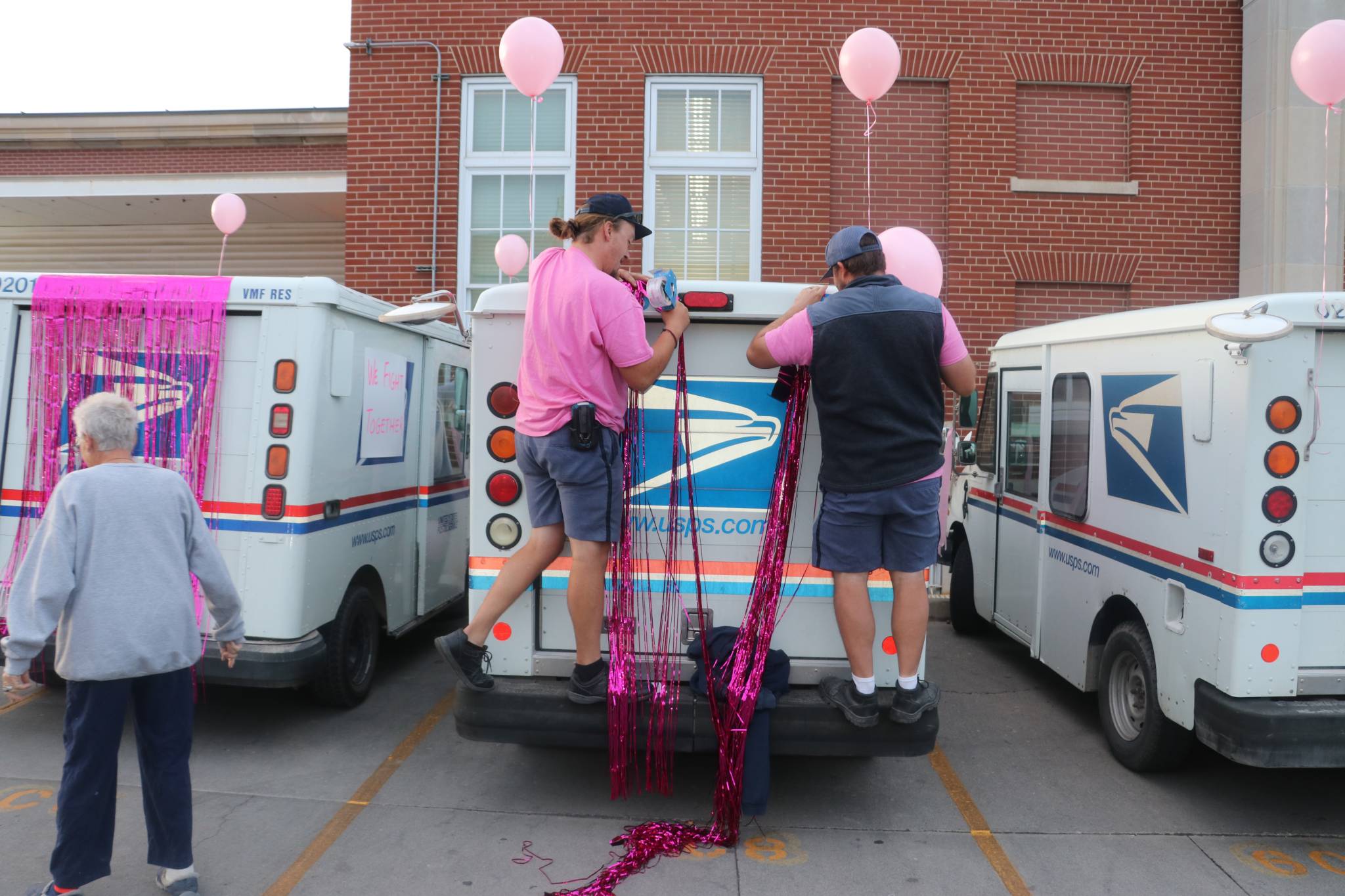 U.S. postal workers for the post office in Price joined together on Oct. 11 to show love and support to their fellow mail courier, Jennifer Slavensky.