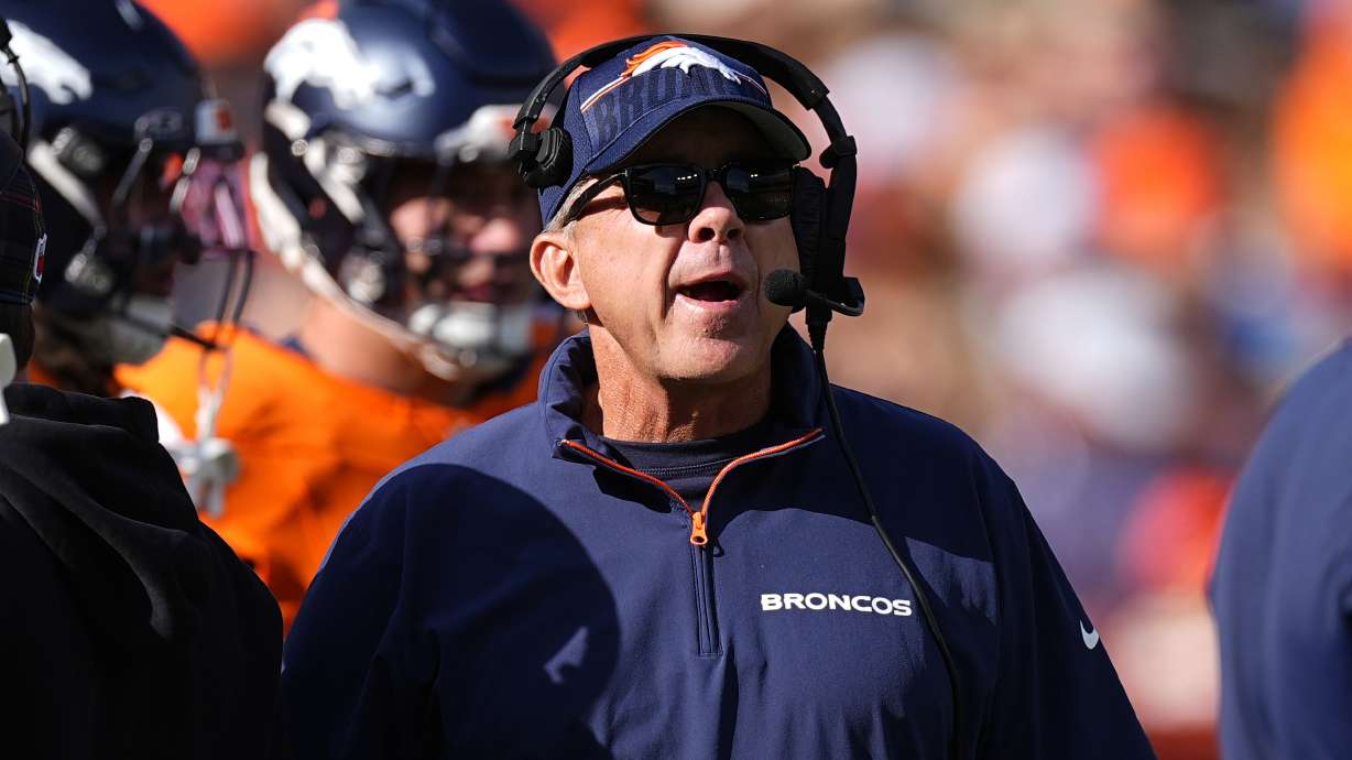 Denver Broncos head coach Sean Payton looks on during the first half of an NFL football game against the Los Angeles Chargers, Sunday, Oct. 13, 2024, in Denver.