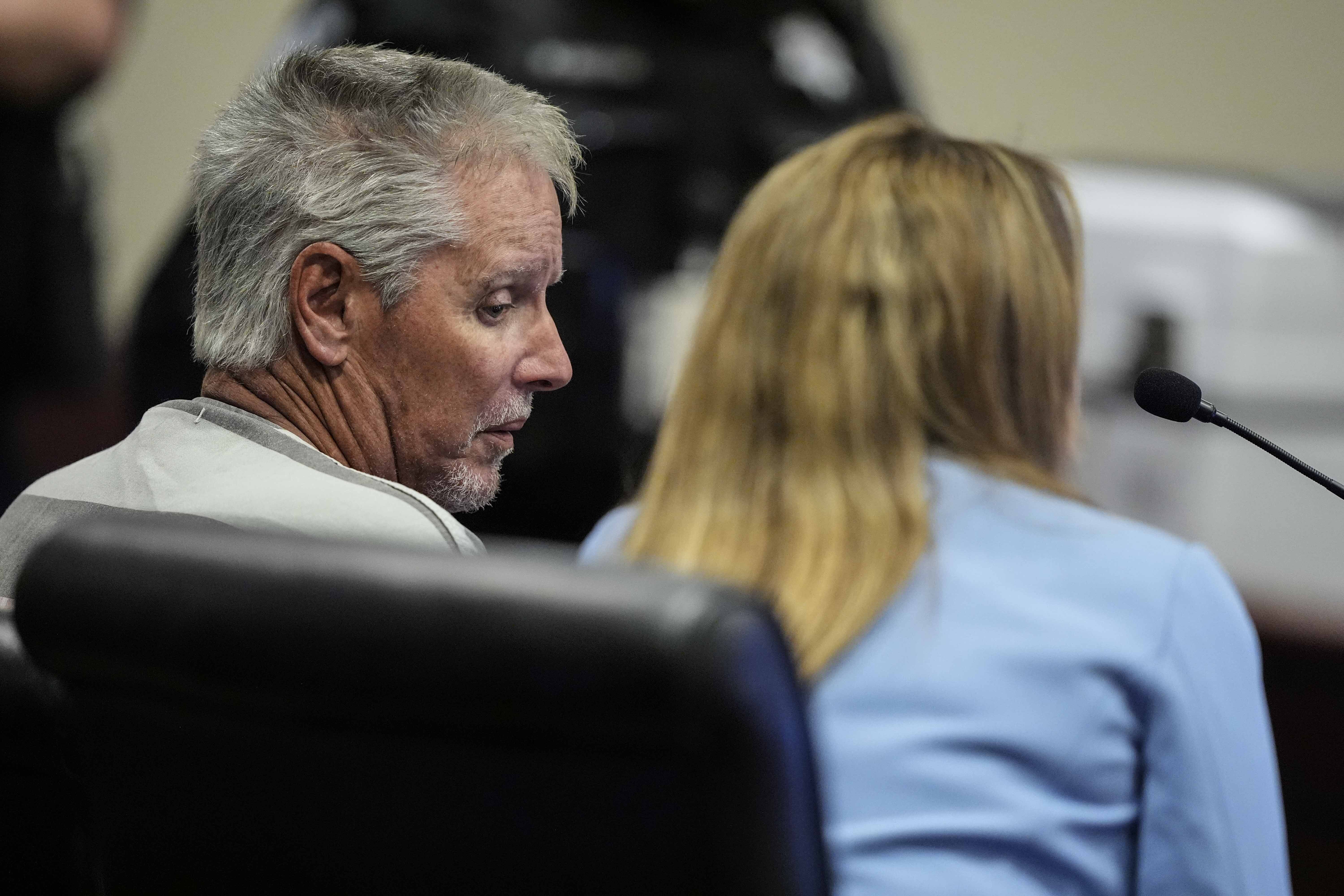 Colin Gray, 54, the father of alleged Apalachee High School shooter Colt Gray, 14, sits in the Barrow County courthouse for his first appearance, Sept. 6 in Winder, Ga. A grand jury has indicted the two after the mass shooting at Apalachee High School in Winder on Sept. 4.