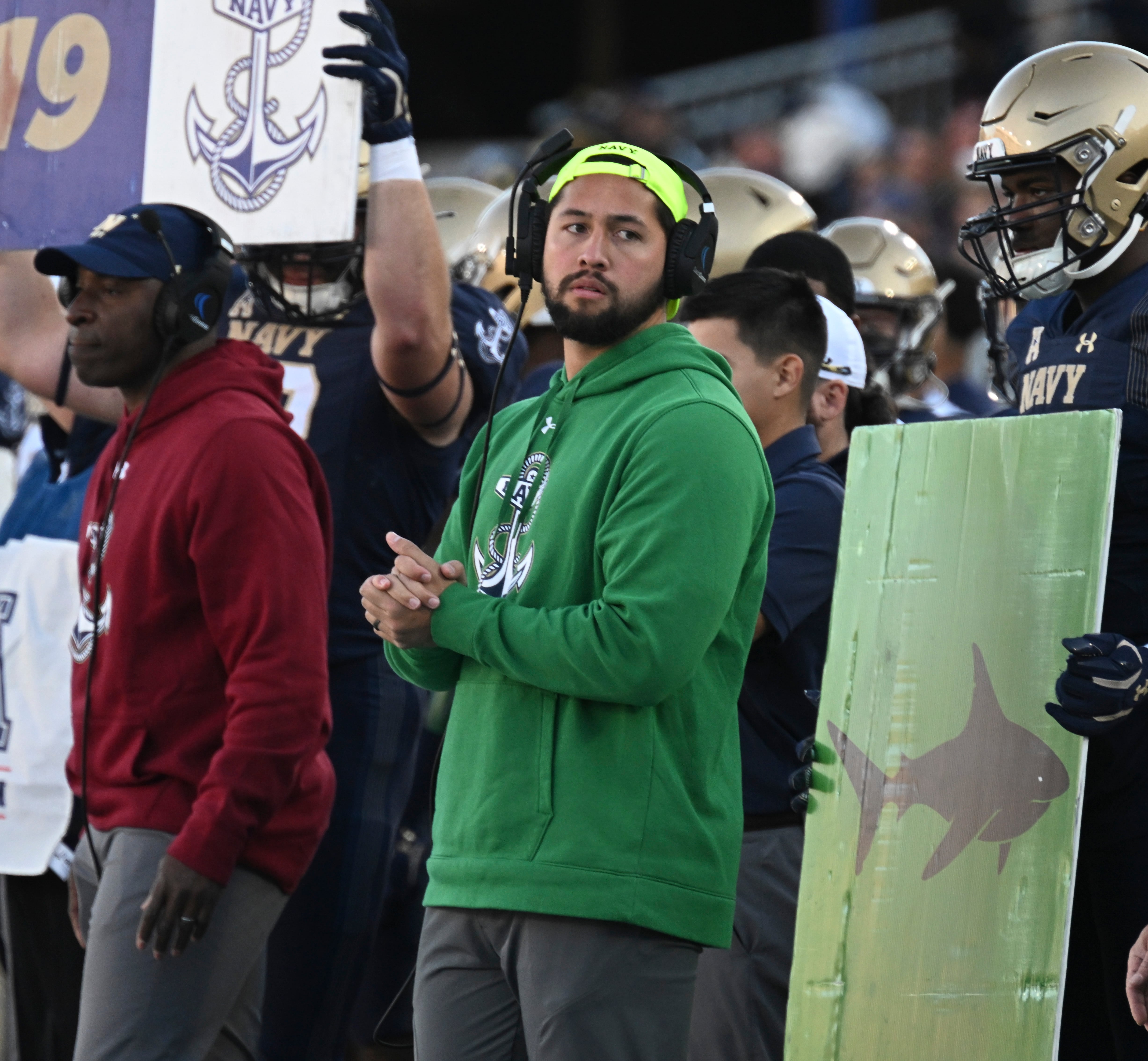 Former BYU football player and returned missionary Va'a Niumatalolo patrols the sideline of a recent Navy football game.