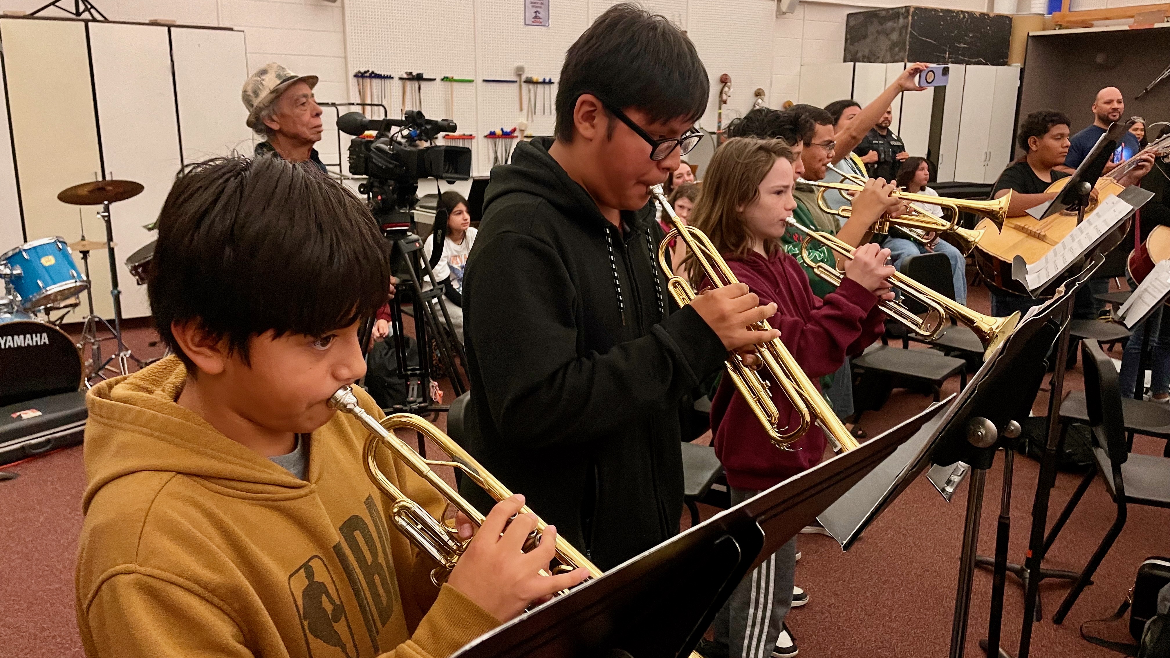 Trumpeters in the mariachi class at Jefferson Junior High School in Kearns play at a gathering held Wednesday  with Mariachi Fuego de Utah, an experienced youth ensemble.