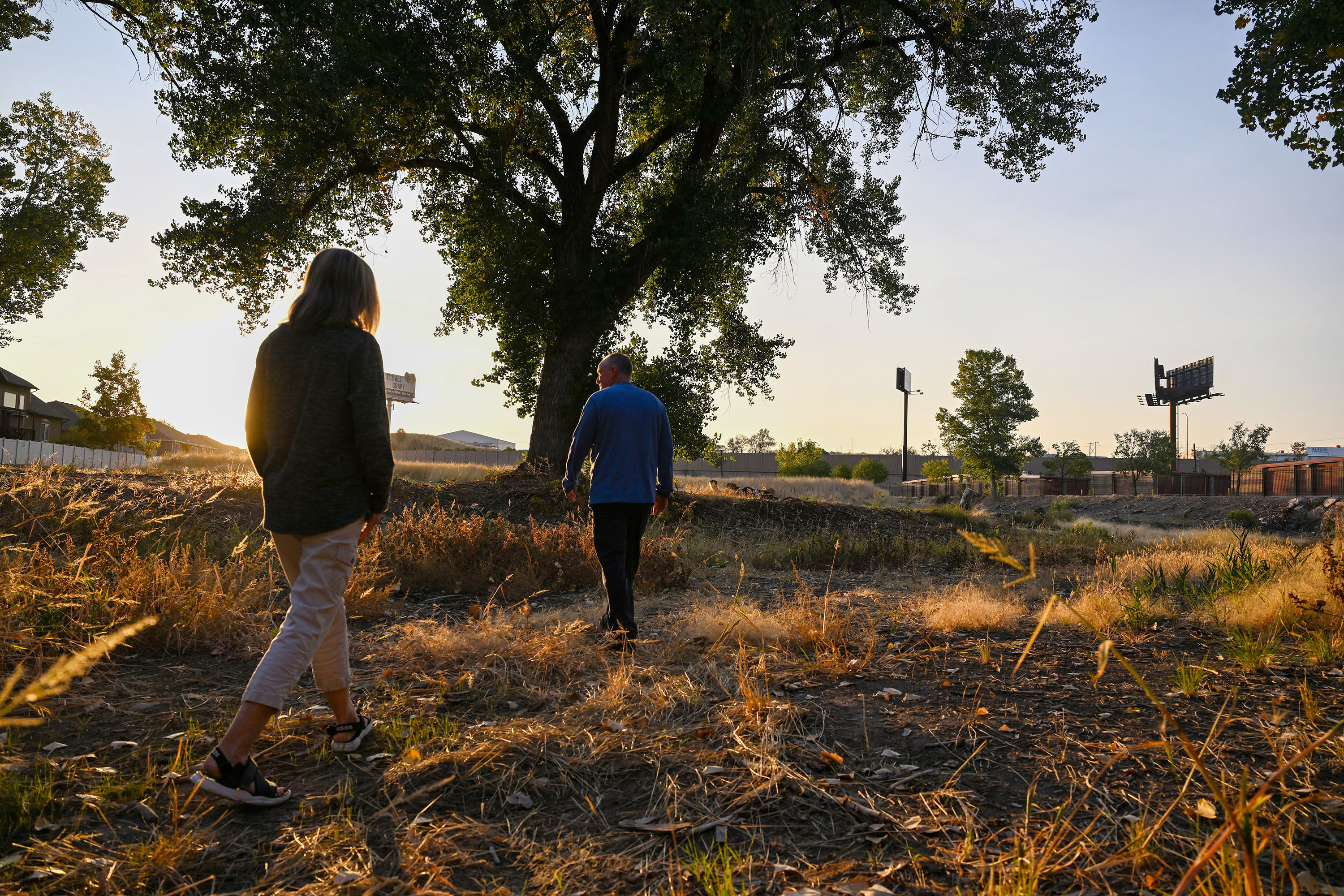 James and Julie Purin show their land that they would like to develop in Riverdale on Tuesday. The Purins are in a land dispute with the city.