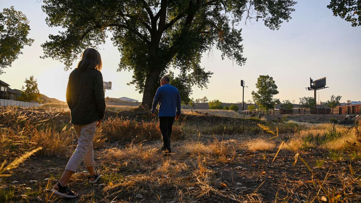 James and Julie Purin show their land that they would like to develop in Riverdale on Tuesday. The Purins are in a land dispute with the city.