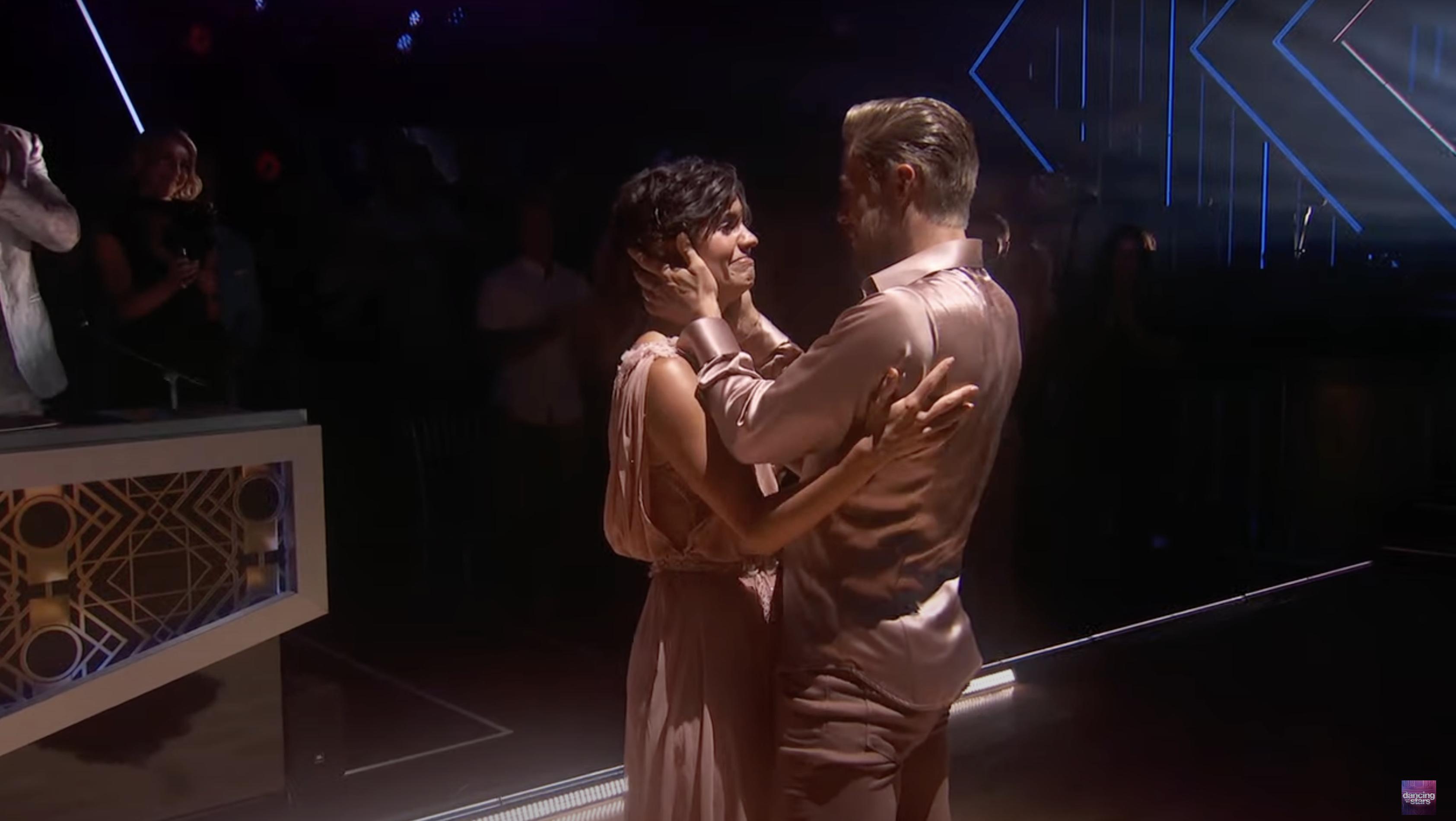 Hayley Erbert Hough and Derek Hough embrace after a moving performance on "Dancing with the Stars." 