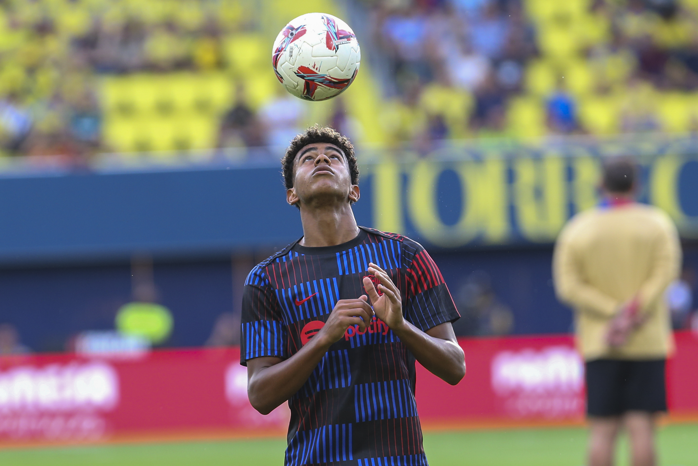 Barcelona's Lamine Yamal controls a ball prior to a Spanish La Liga soccer match against Villarreal at the La CerĂ¡mica stadium in Villarreal, Spain, Sunday, Sept. 22, 2024.