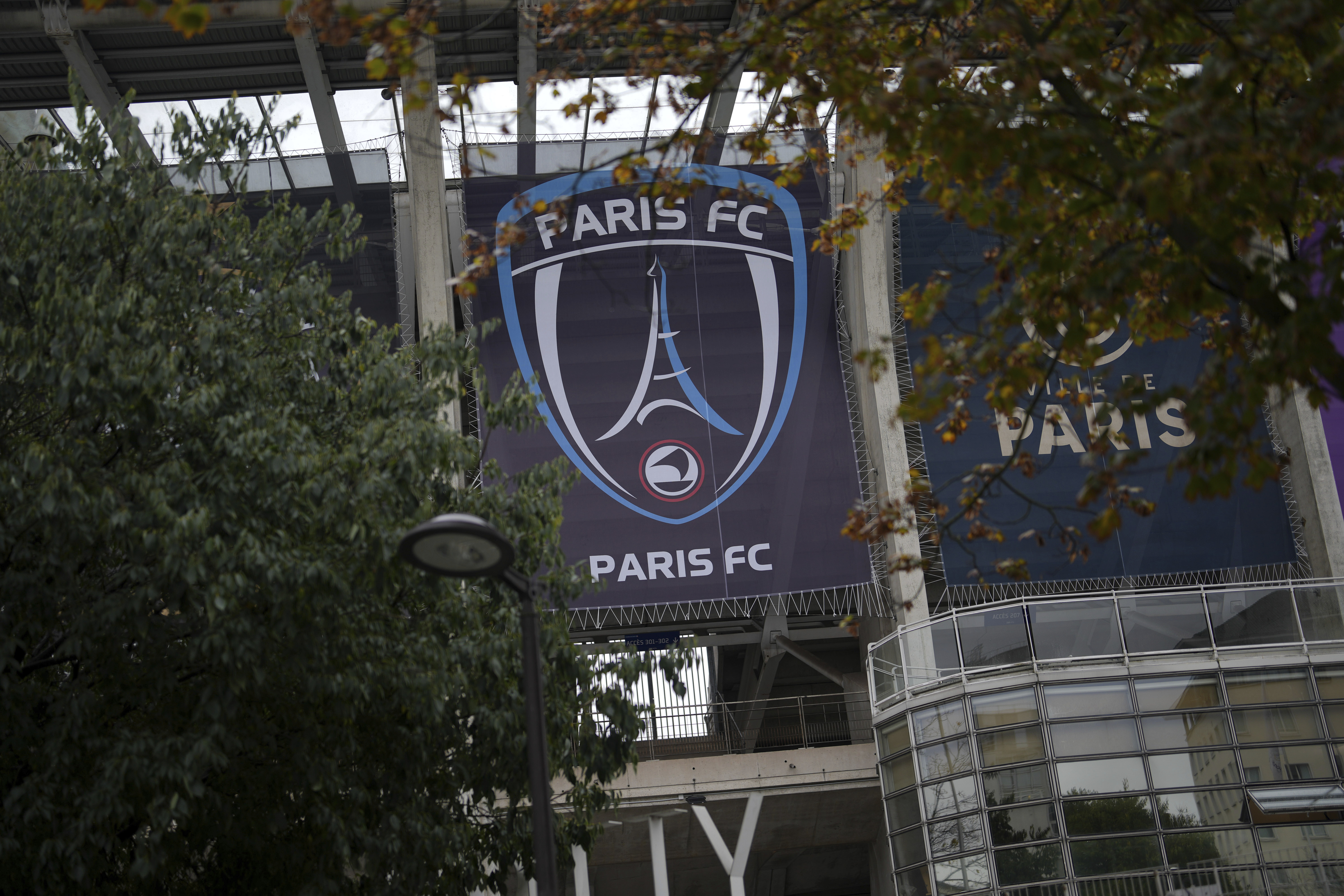 The Paris FC soccer club banner is seen outside the Charlety stadium in Paris, France, Thursday, Oct.17, 2024. 