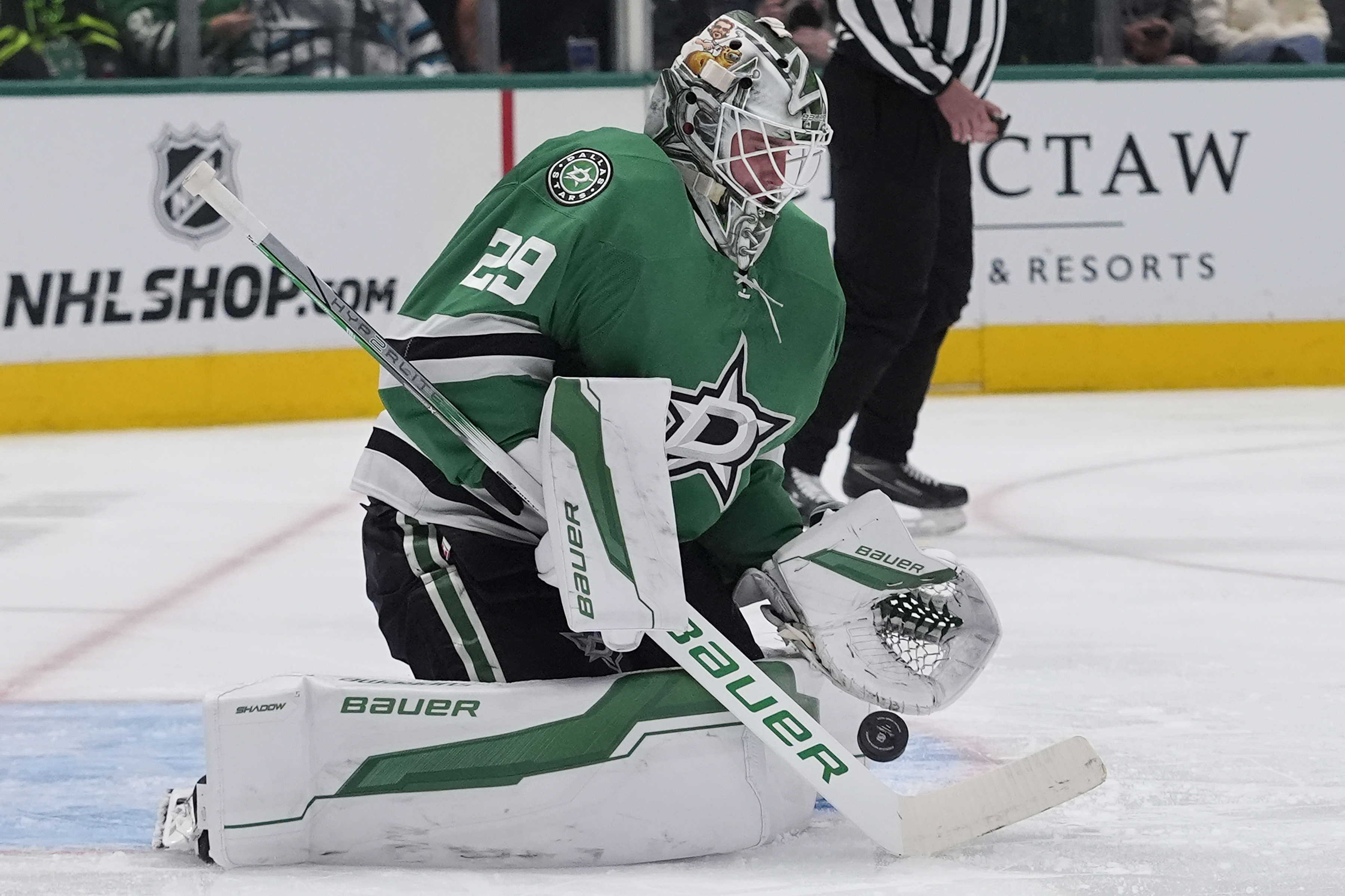Dallas Stars goaltender Jake Oettinger (29) defends the goal during the second period of an an NHL hockey game against the San Jose Sharks Tuesday, Oct. 15, 2024, in Dallas.