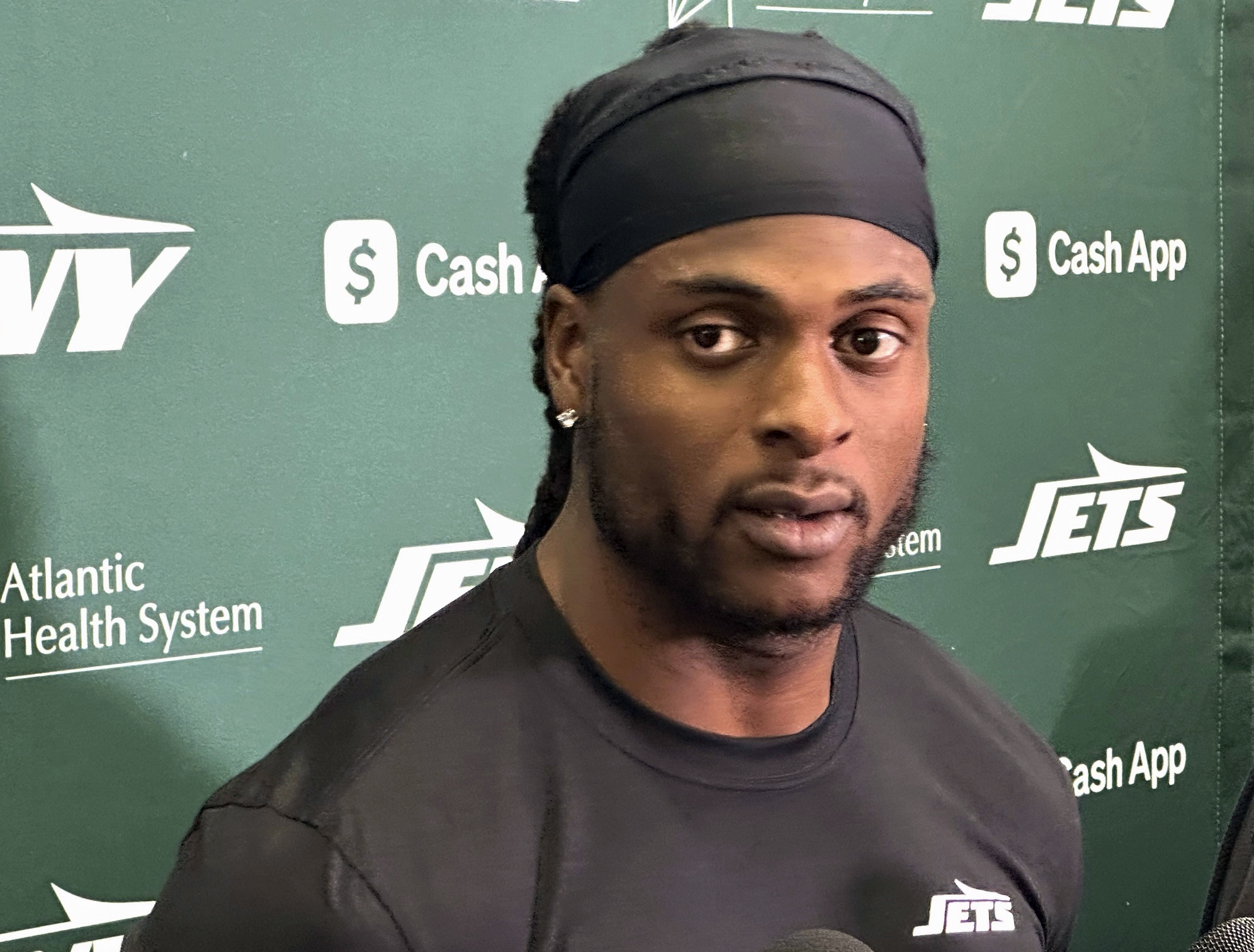 New York Jets wide receiver Davante Adams speaks to reporters at the team's facility in Florham Park, N.J., on Wednesday, Oct. 16, 2024. 