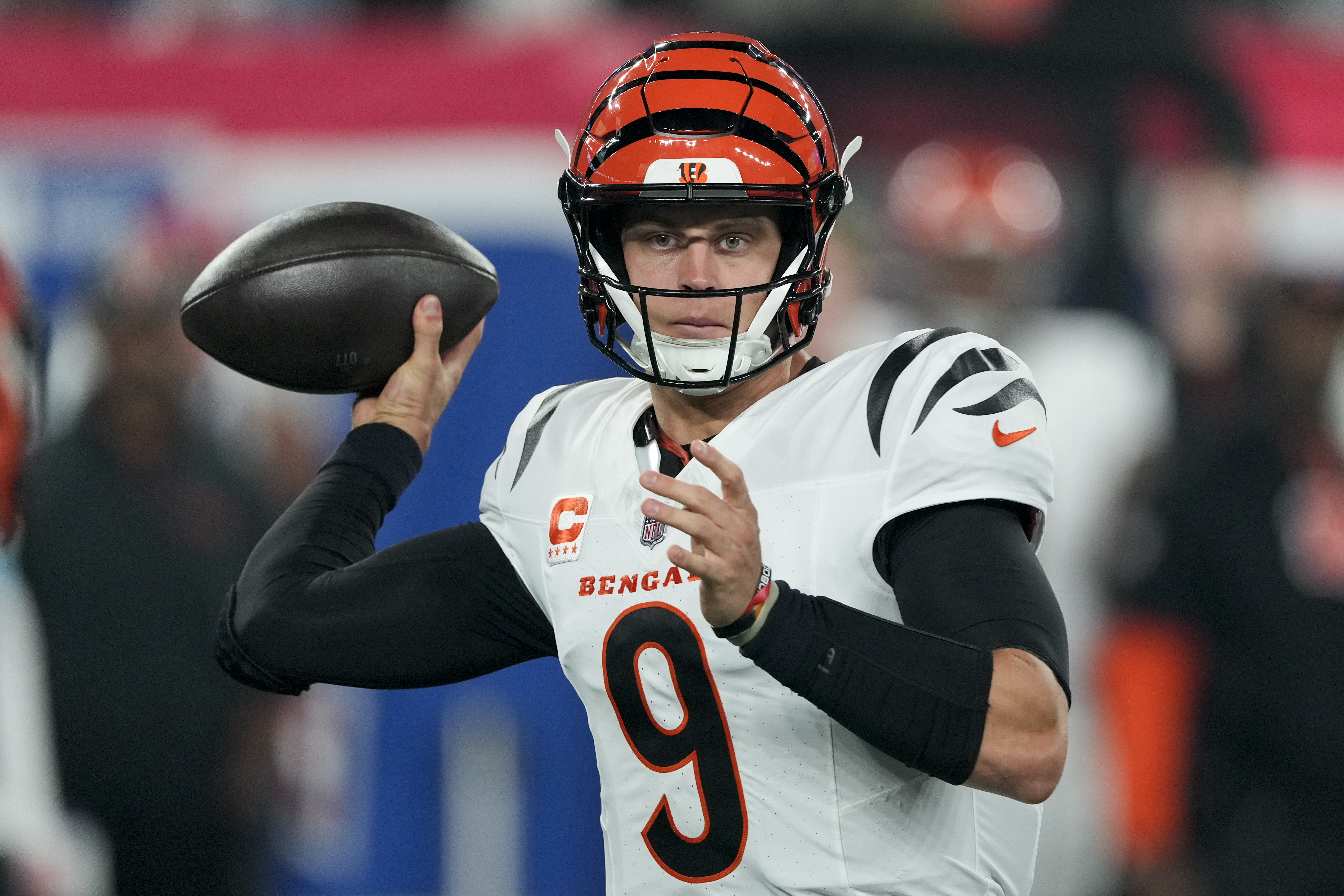 Cincinnati Bengals quarterback Joe Burrow (9) throws a pass during the first half of an NFL football game against the New York Giants, Sunday, Oct. 13, 2024, in East Rutherford, N.J.