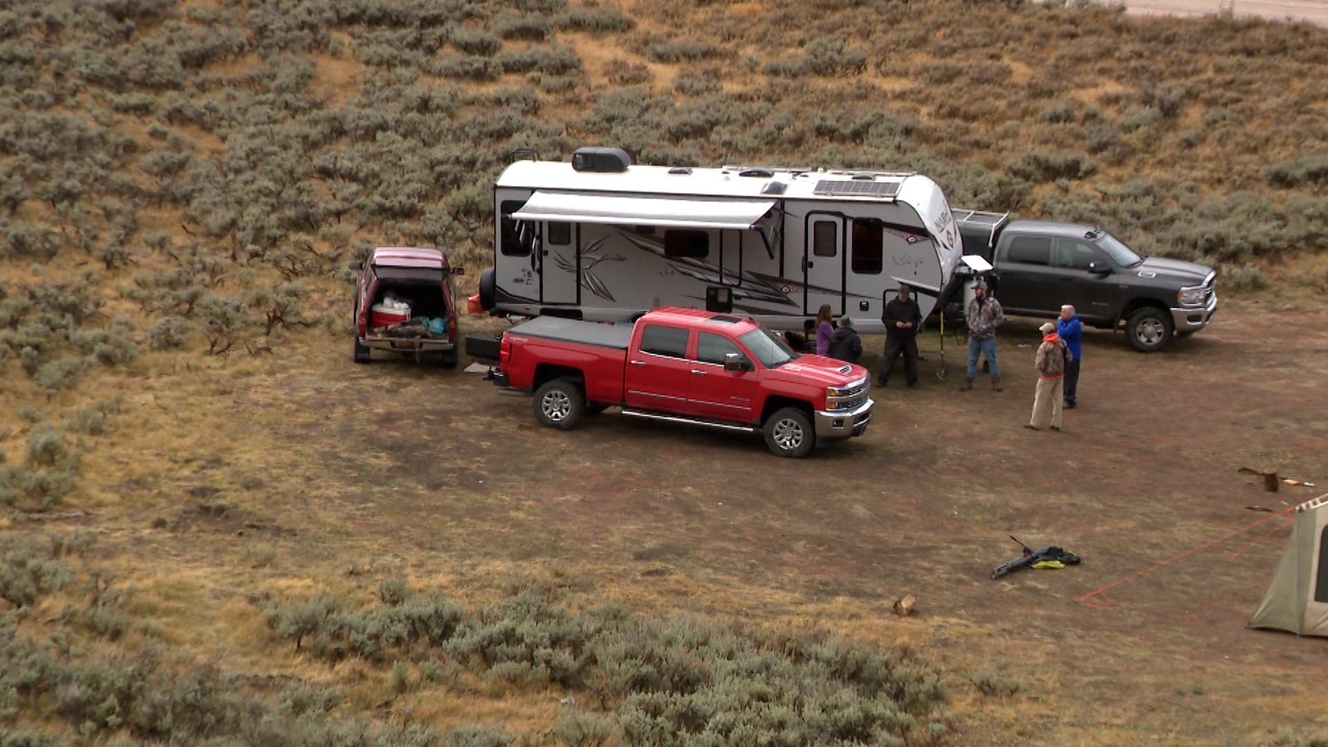 It rained on and off for a good part of the day Thursday, but the tent with a stove kept David Strange and his friends warm. However, they know snow is coming.